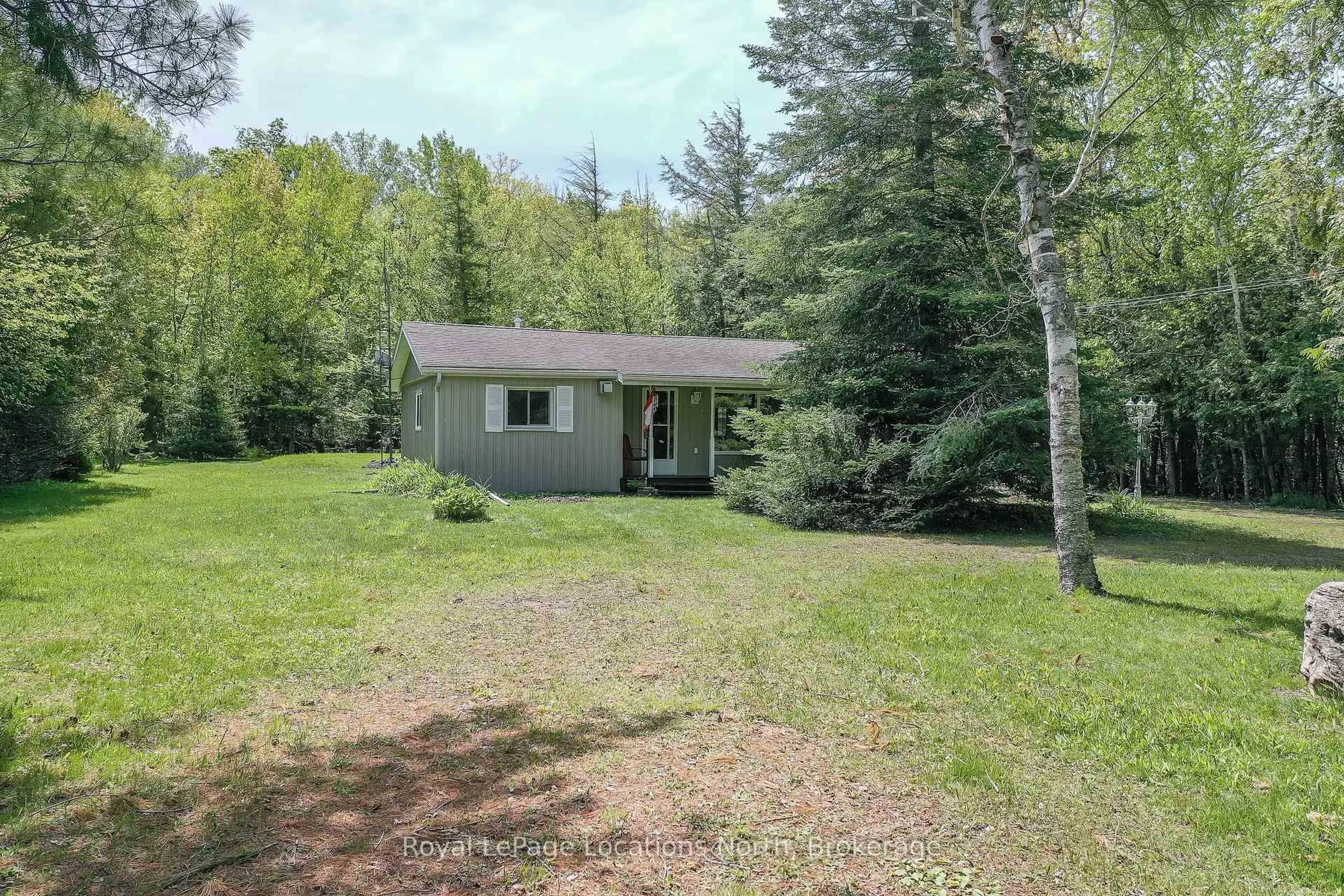 A pic from outside/outdoor area/front of a property/back of a property/a pic from drone, forest/trees view for 2198 Champlain Rd, Tiny Ontario L9M 0C4