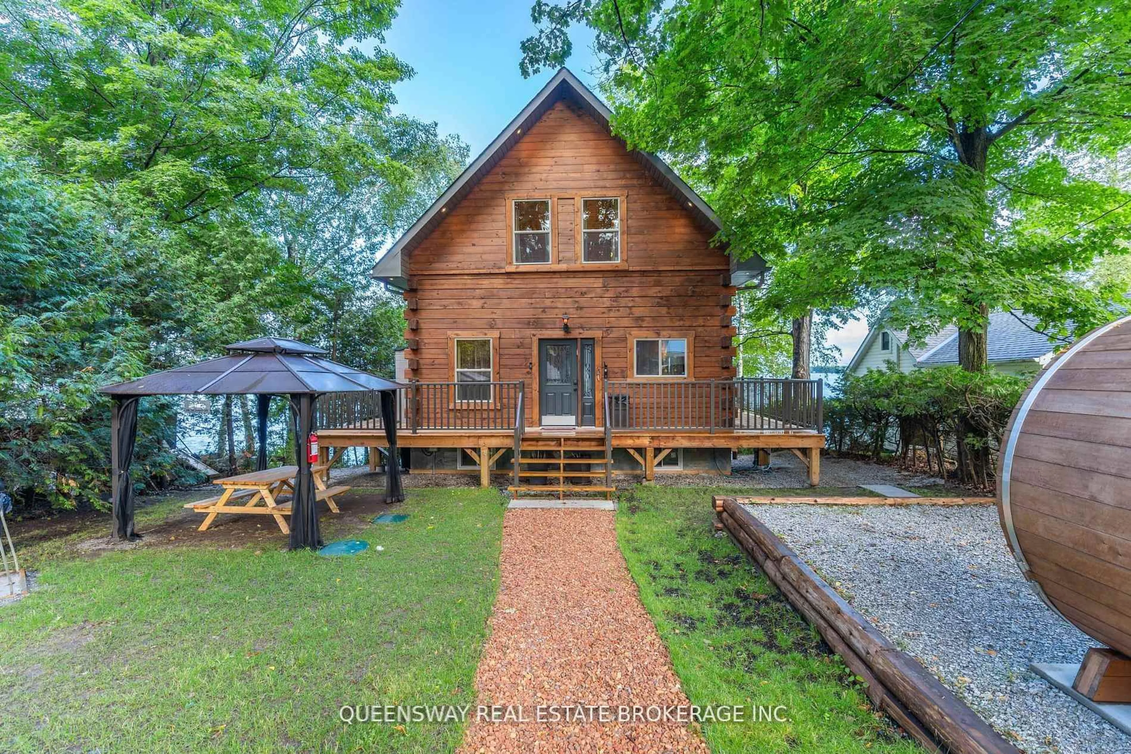 A pic from outside/outdoor area/front of a property/back of a property/a pic from drone, water/lake/river/ocean view for 1280 Black Beach Lane, Ramara Ontario L0K 1B0