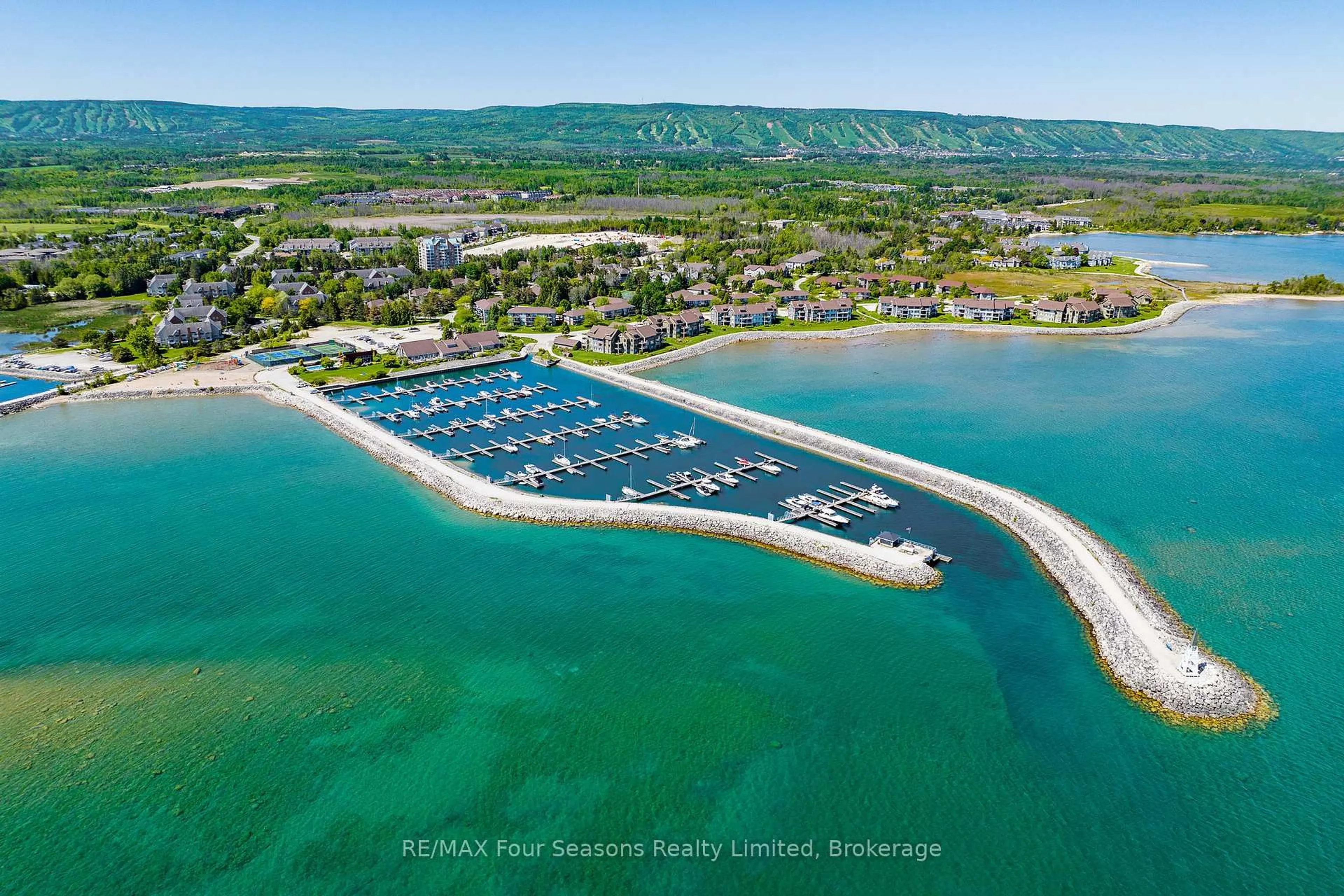 A pic from outside/outdoor area/front of a property/back of a property/a pic from drone, water/lake/river/ocean view for 373 MARINERS Way, Collingwood Ontario L9Y 5C7