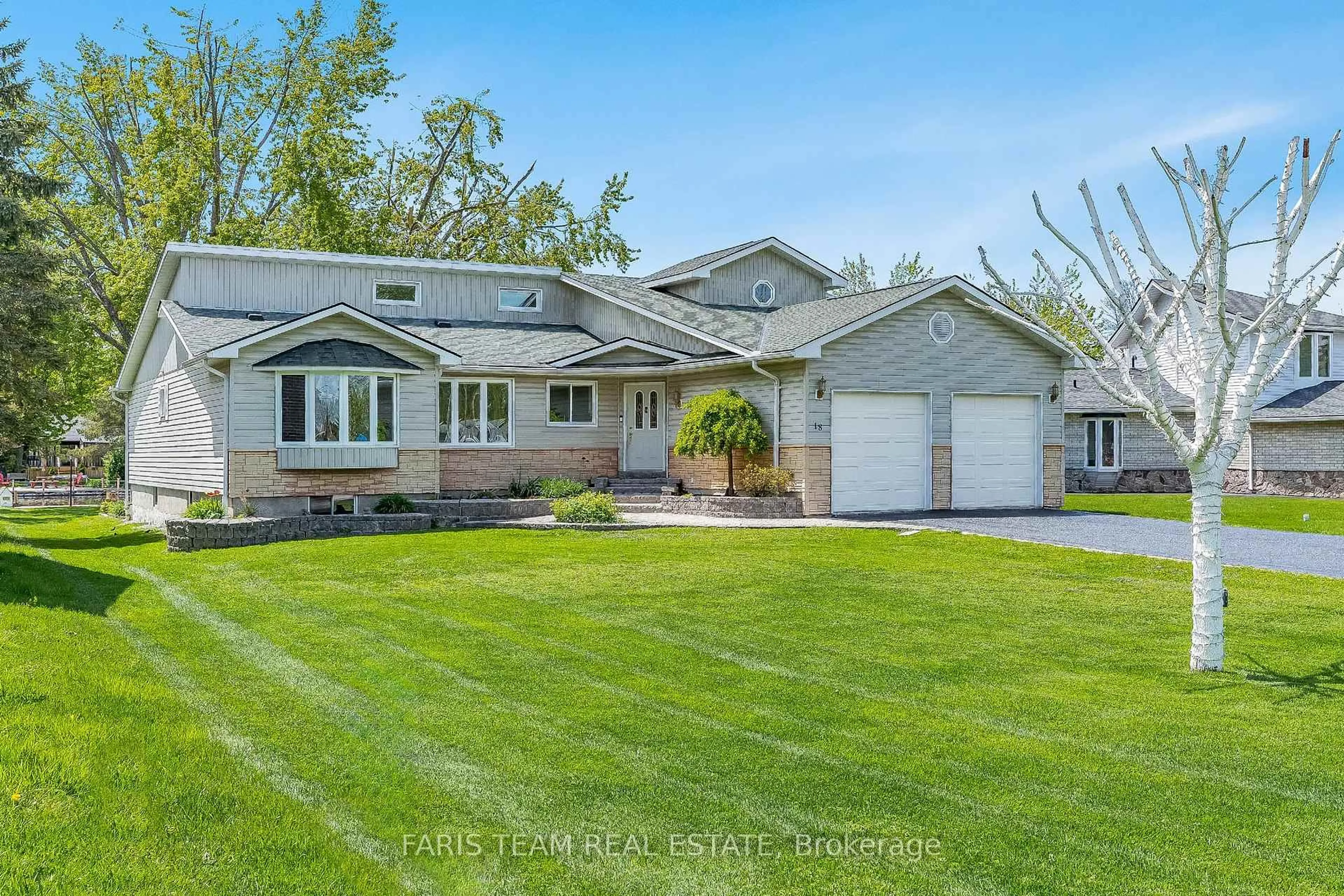 Home with vinyl exterior material, street for 18 Turtle Path, Ramara Ontario L0K 2B0