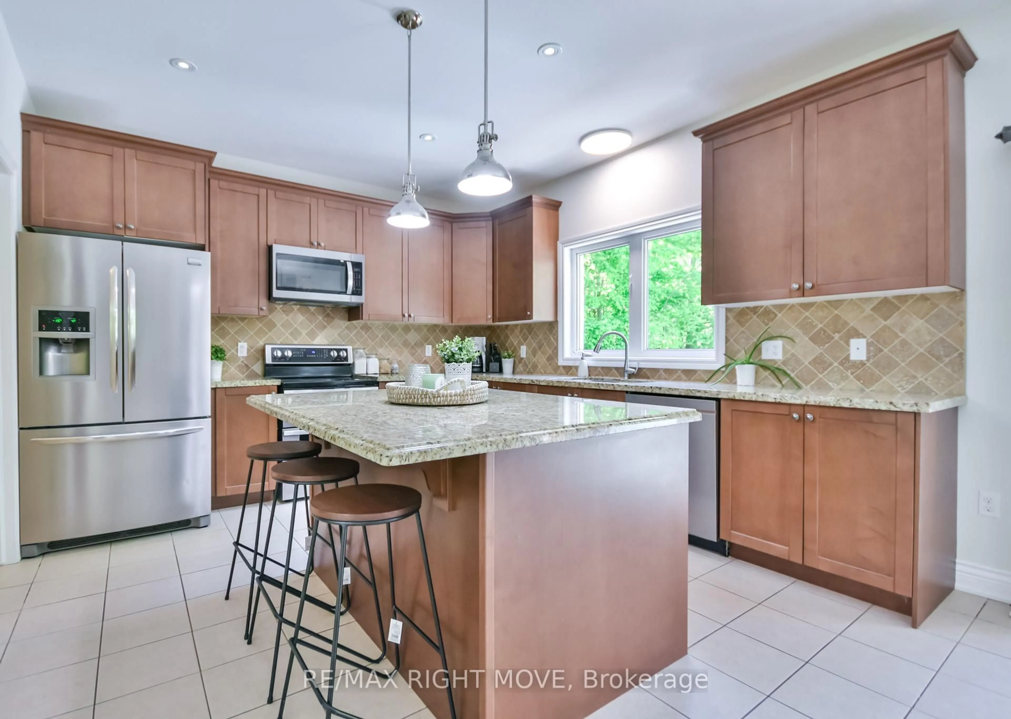 Open concept kitchen, ceramic/tile floor for 10 Merrington Ave, Oro-Medonte Ontario L3V 0R5