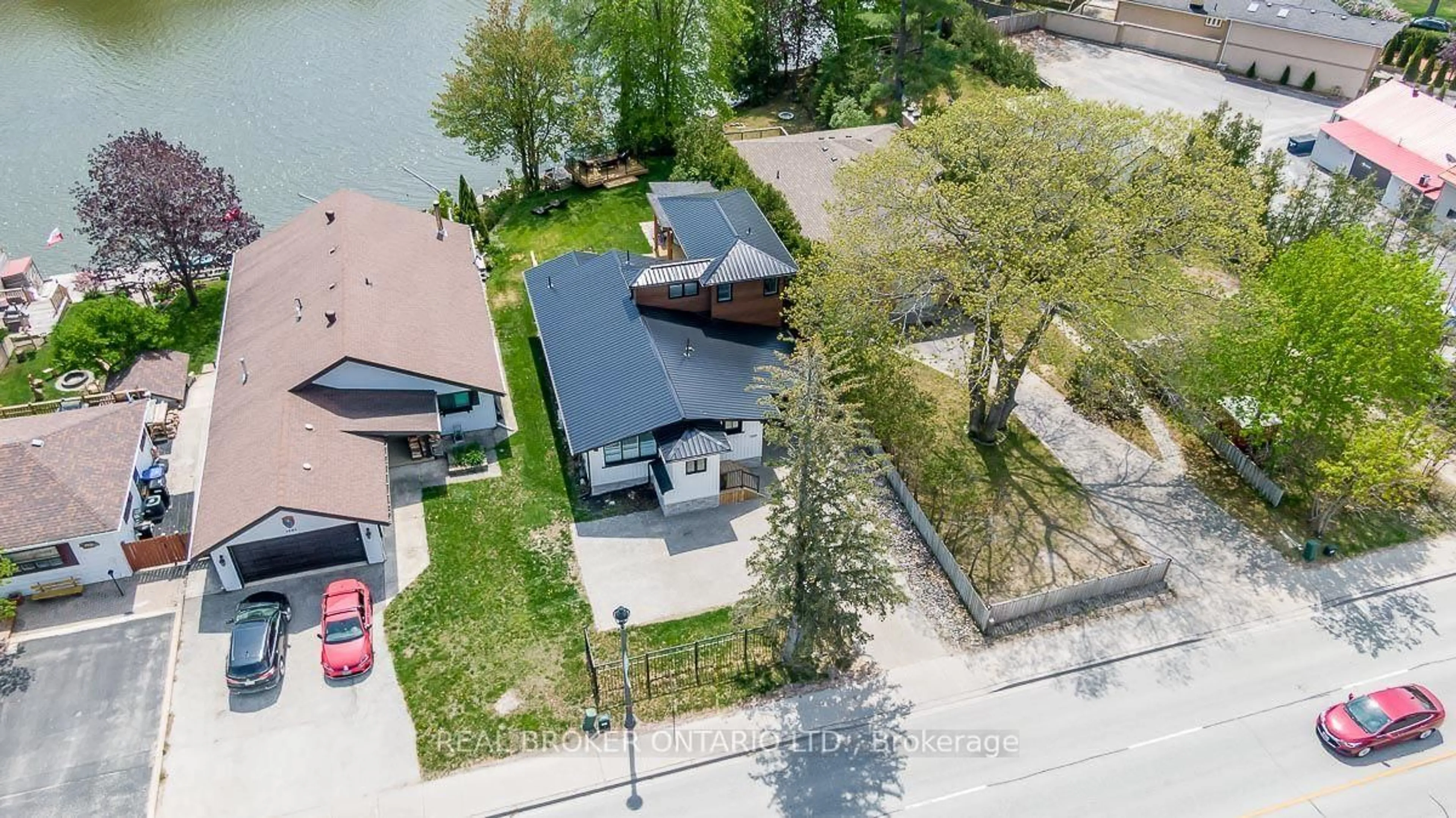 A pic from outside/outdoor area/front of a property/back of a property/a pic from drone, water/lake/river/ocean view for 1359 Mosley St, Wasaga Beach Ontario L9Z 2C7