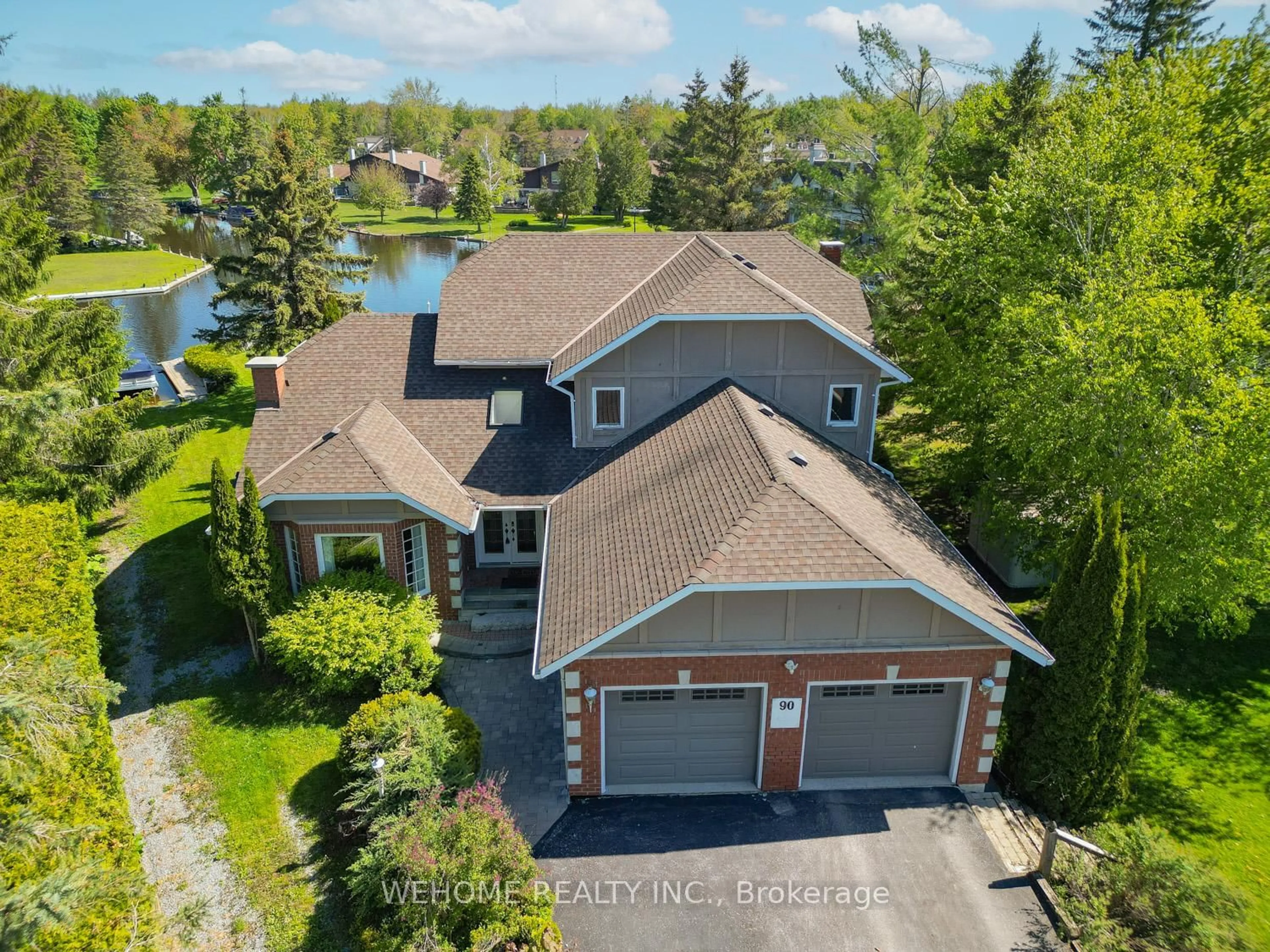 A pic from outside/outdoor area/front of a property/back of a property/a pic from drone, water/lake/river/ocean view for 90 Turtle Path, Ramara Ontario L0K 1B0