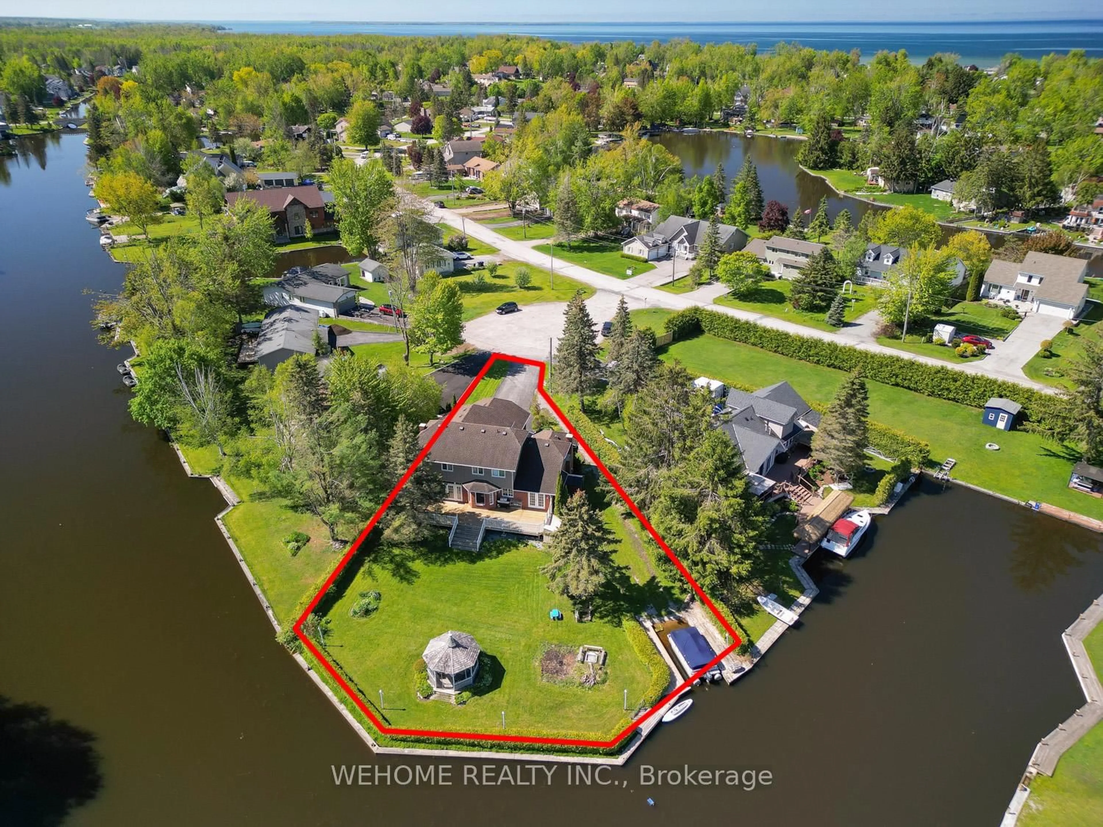A pic from outside/outdoor area/front of a property/back of a property/a pic from drone, water/lake/river/ocean view for 90 Turtle Path, Ramara Ontario L0K 1B0