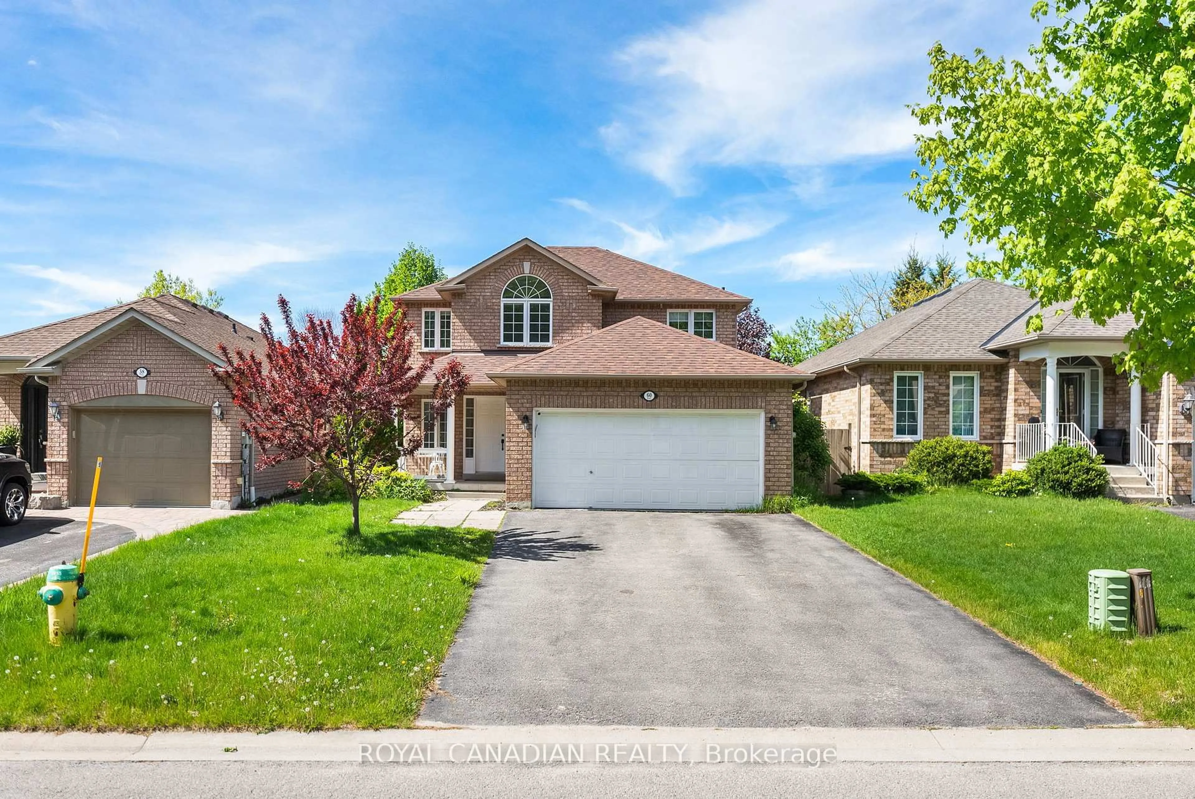 Home with brick exterior material, street for 60 Crimson Ridge Rd, Barrie Ontario L4N 0G7