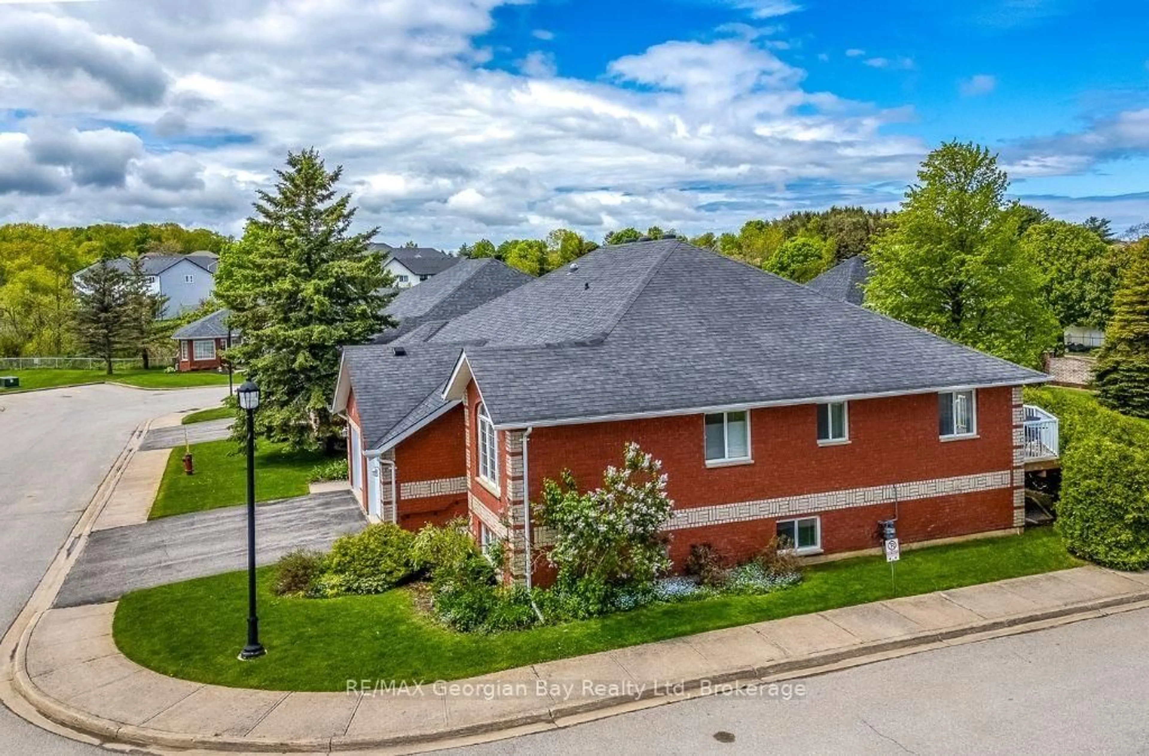 A pic from outside/outdoor area/front of a property/back of a property/a pic from drone, street for 90 Thompson Rd #20, Penetanguishene Ontario L9M 2H1