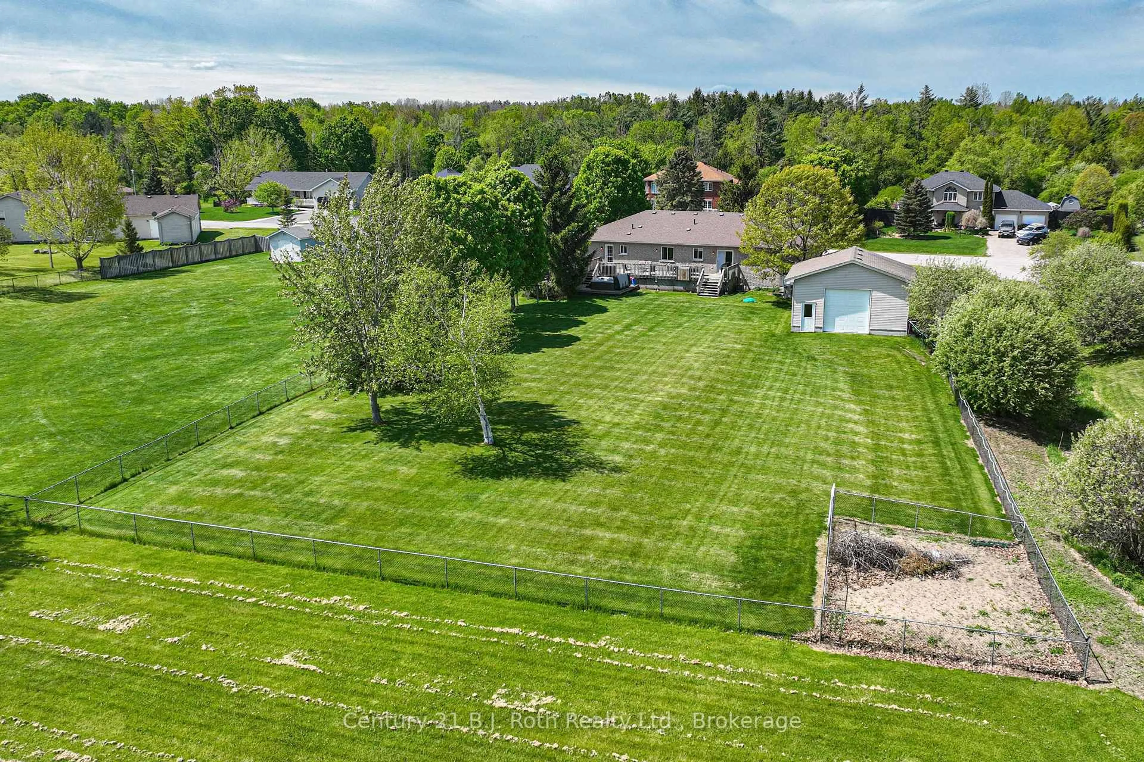 A pic from outside/outdoor area/front of a property/back of a property/a pic from drone, water/lake/river/ocean view for 28 Marl Creek Dr, Springwater Ontario L0L 2K0
