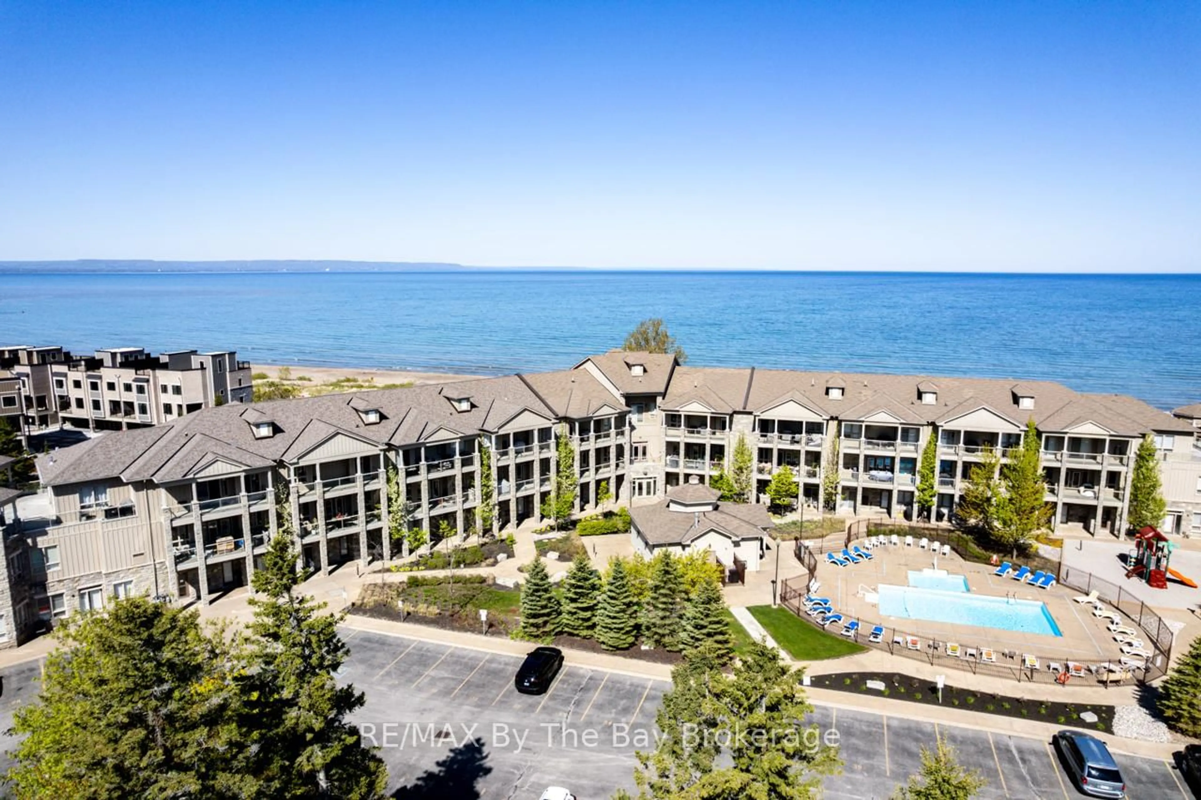 A pic from outside/outdoor area/front of a property/back of a property/a pic from drone, water/lake/river/ocean view for 764 RIVER Rd #213, Wasaga Beach Ontario L9Z 2M7