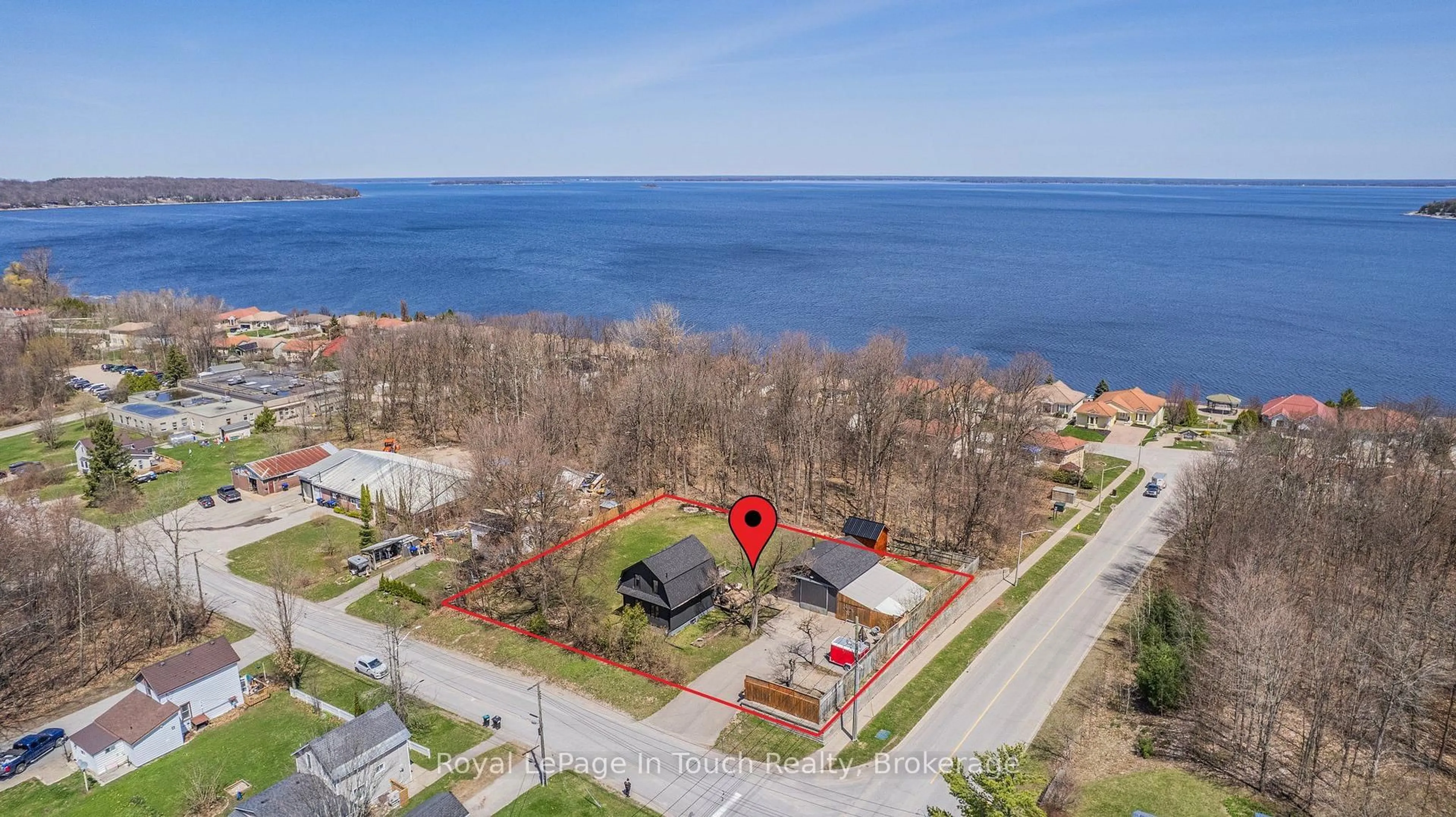 A pic from outside/outdoor area/front of a property/back of a property/a pic from drone, water/lake/river/ocean view for 381 Olive St, Midland Ontario L4R 2R4