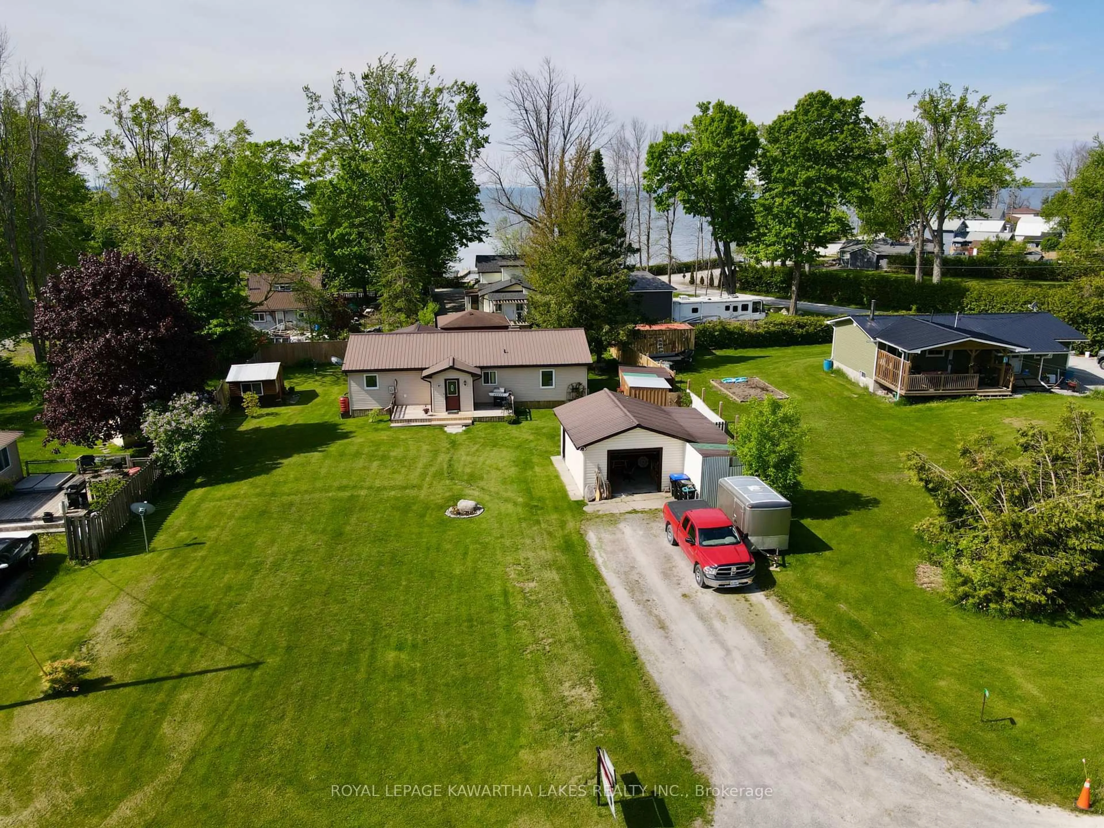 A pic from outside/outdoor area/front of a property/back of a property/a pic from drone, street for 1227 Ramara Road 47 Rd, Ramara Ontario L0K 1B0