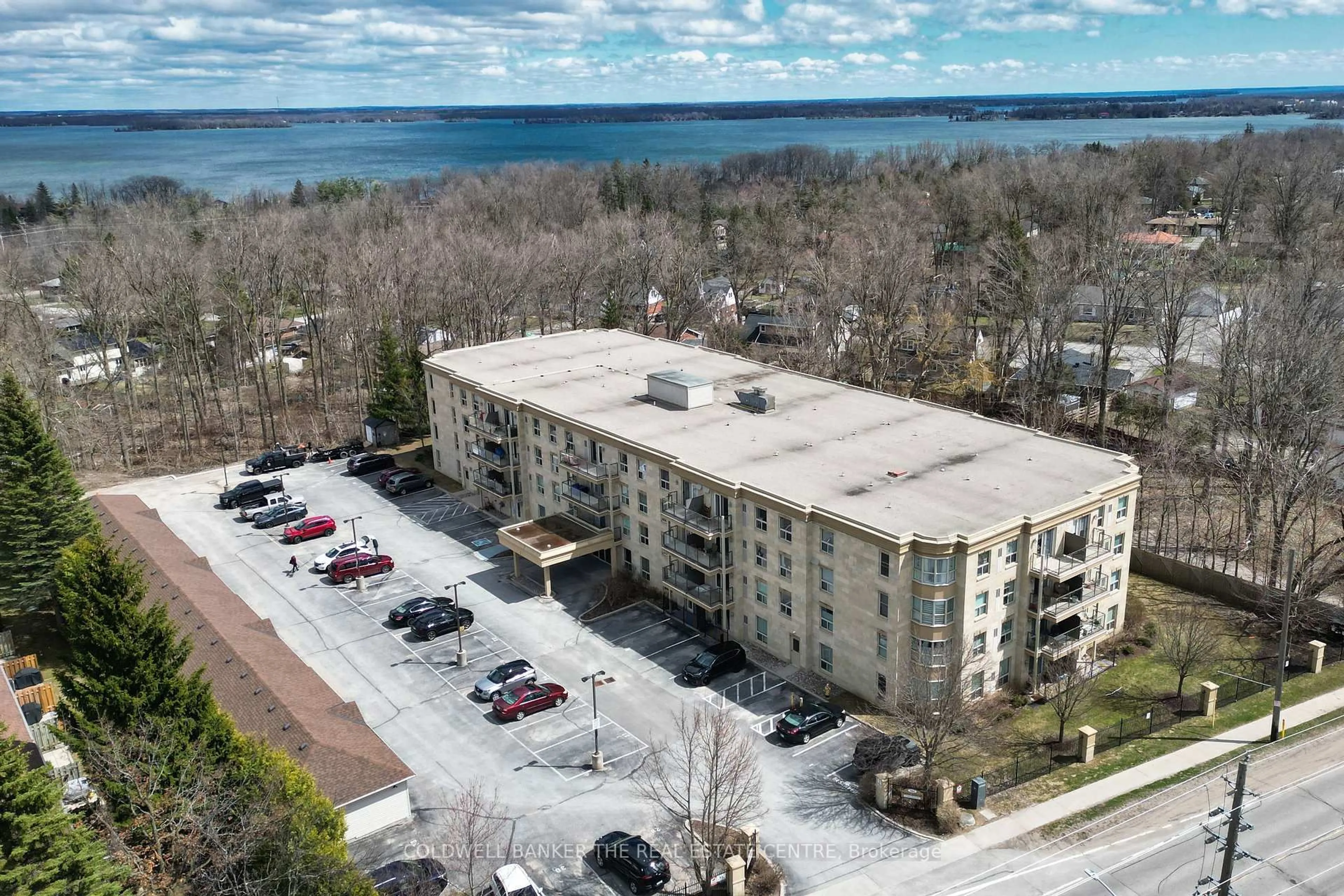 A pic from outside/outdoor area/front of a property/back of a property/a pic from drone, water/lake/river/ocean view for 486 Laclie St #304, Orillia Ontario L3V 4P9