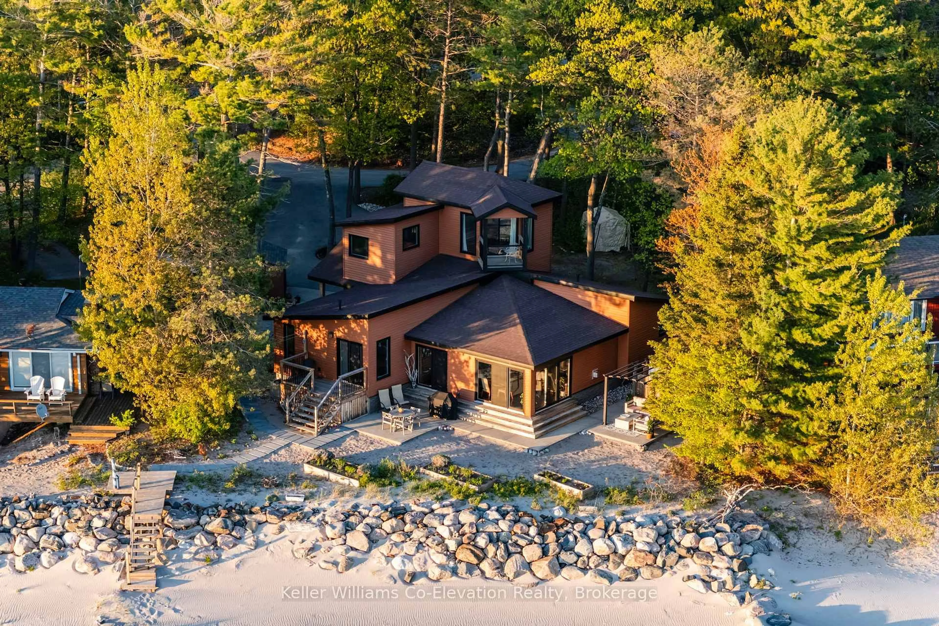 A pic from outside/outdoor area/front of a property/back of a property/a pic from drone, water/lake/river/ocean view for 23 Rue De Parc, Tiny Ontario L9M 1R3