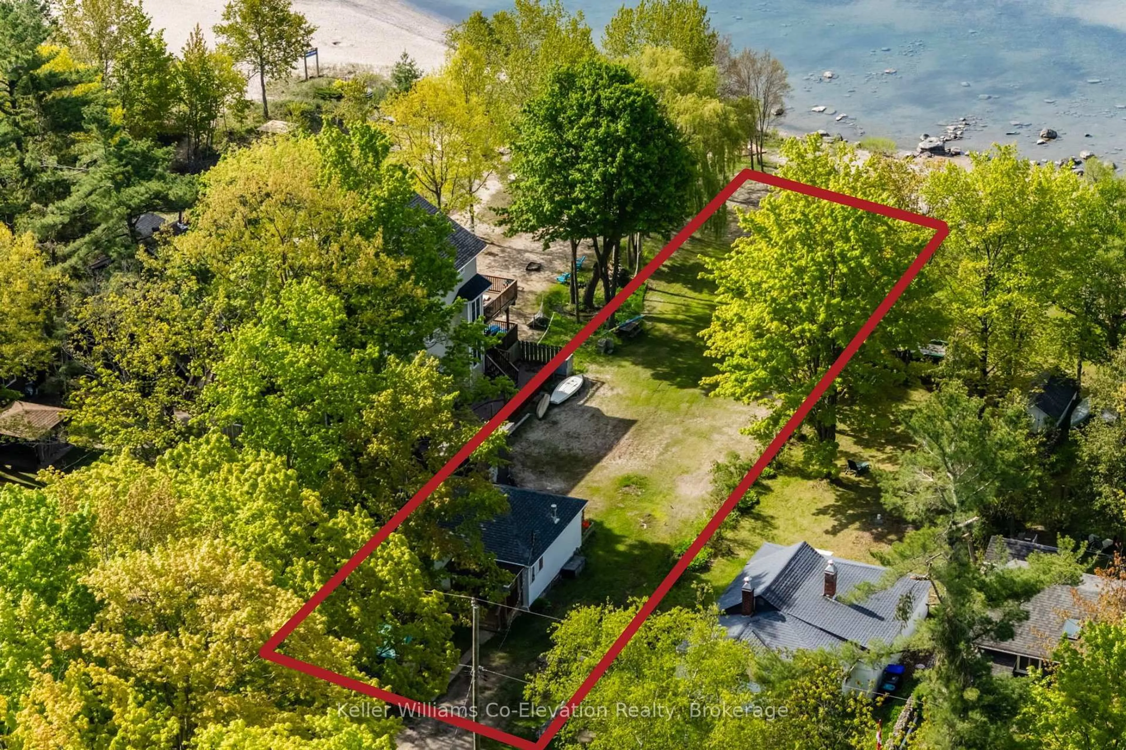 A pic from outside/outdoor area/front of a property/back of a property/a pic from drone, water/lake/river/ocean view for 70 Wahnekewening Dr, Tiny Ontario L9M 0N3
