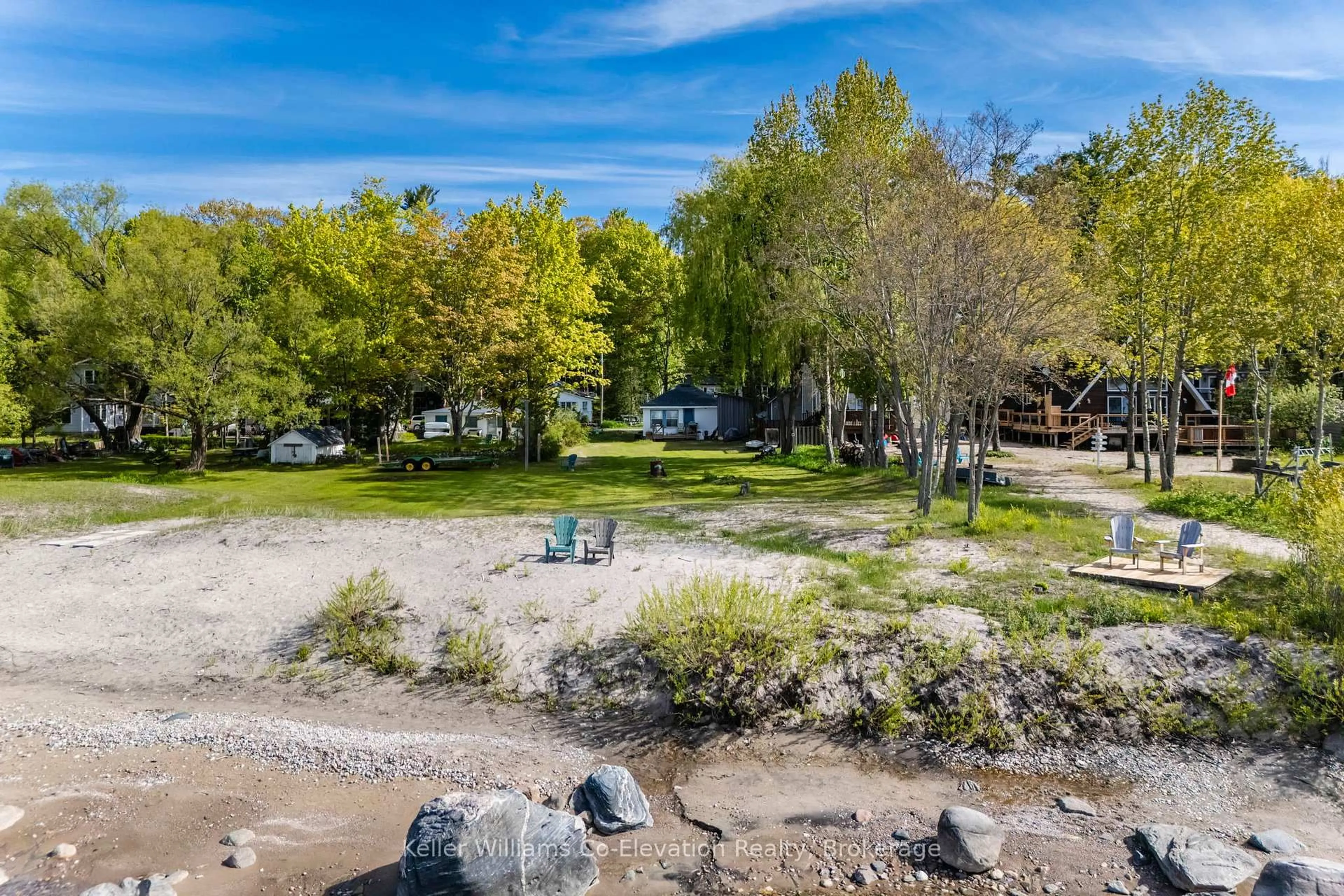 A pic from outside/outdoor area/front of a property/back of a property/a pic from drone, water/lake/river/ocean view for 70 Wahnekewening Dr, Tiny Ontario L9M 0N3
