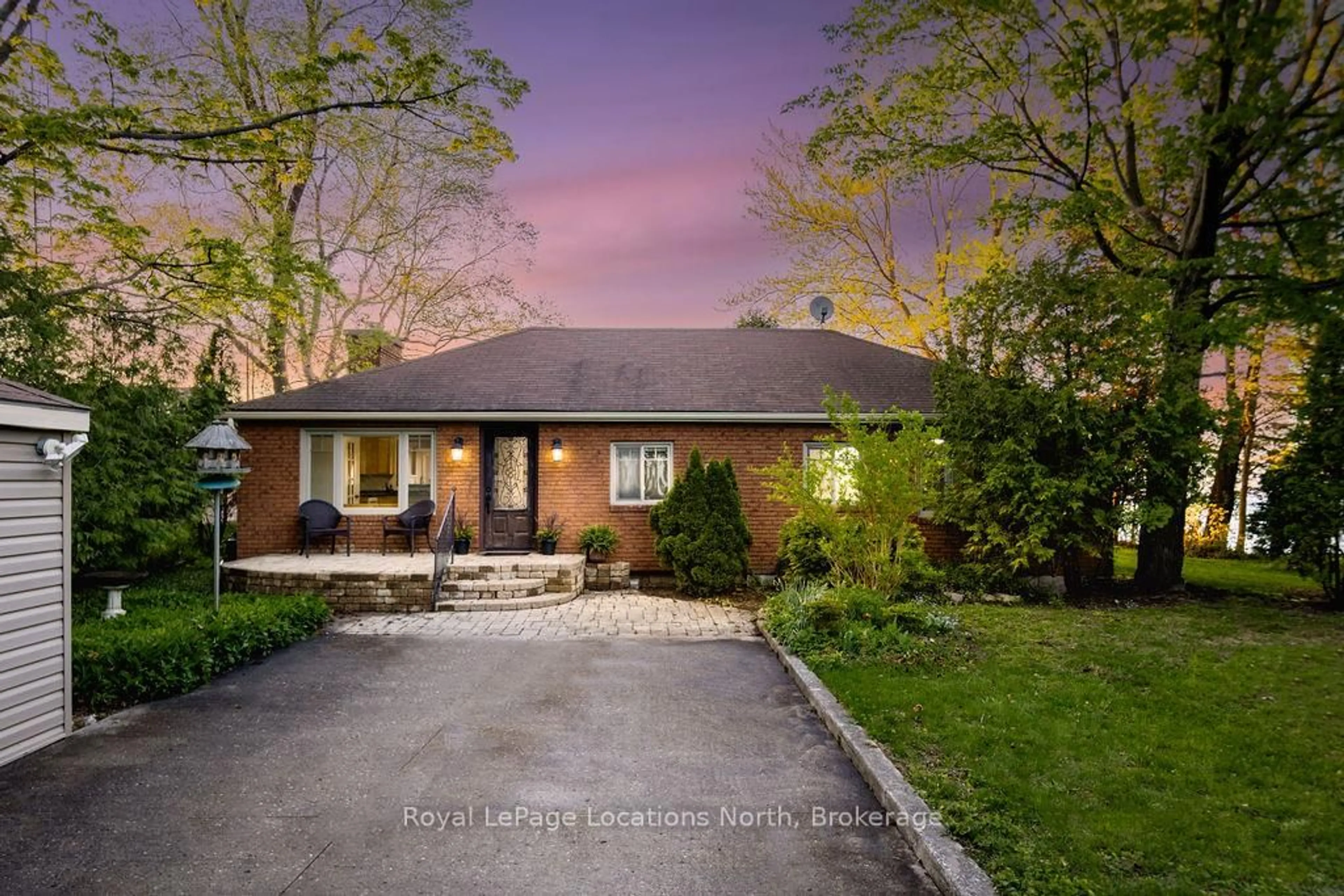 Home with brick exterior material, street for 1946 Shore Lane, Wasaga Beach Ontario L9Z 1T7