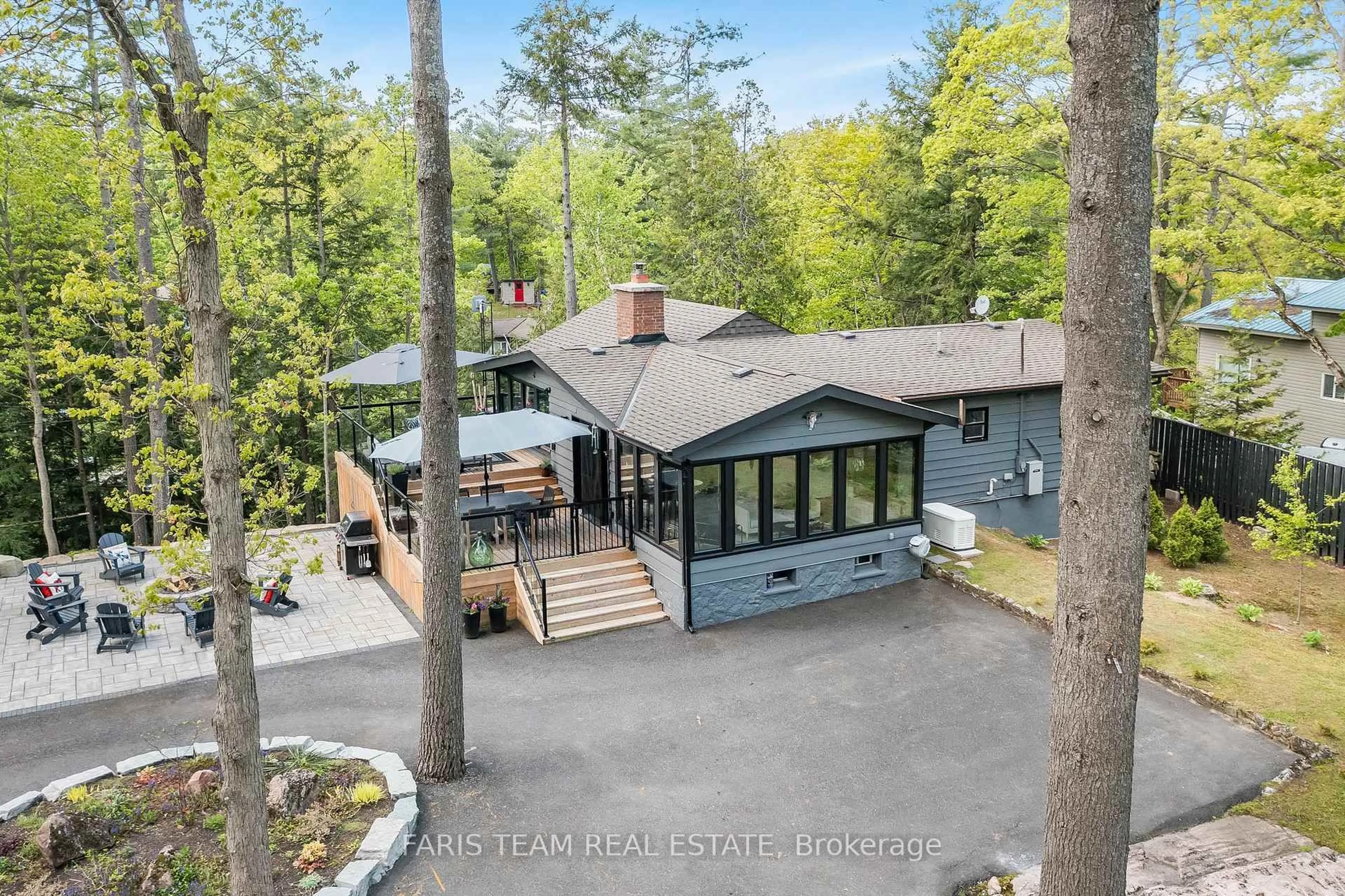 A pic from outside/outdoor area/front of a property/back of a property/a pic from drone, forest/trees view for 7672 Birch Dr, Ramara Ontario L0K 2B0