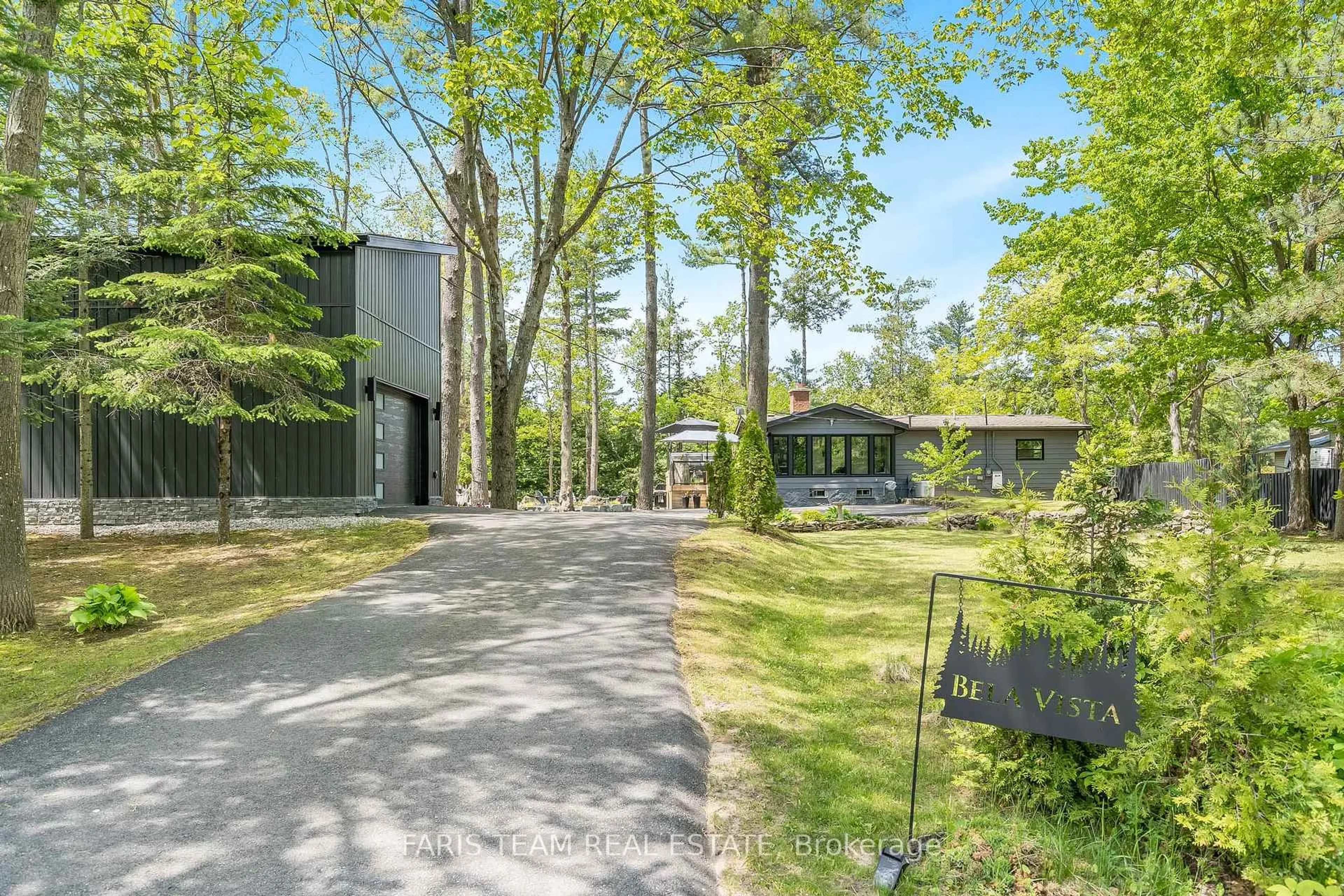 A pic from outside/outdoor area/front of a property/back of a property/a pic from drone, forest/trees view for 7672 Birch Dr, Ramara Ontario L0K 2B0