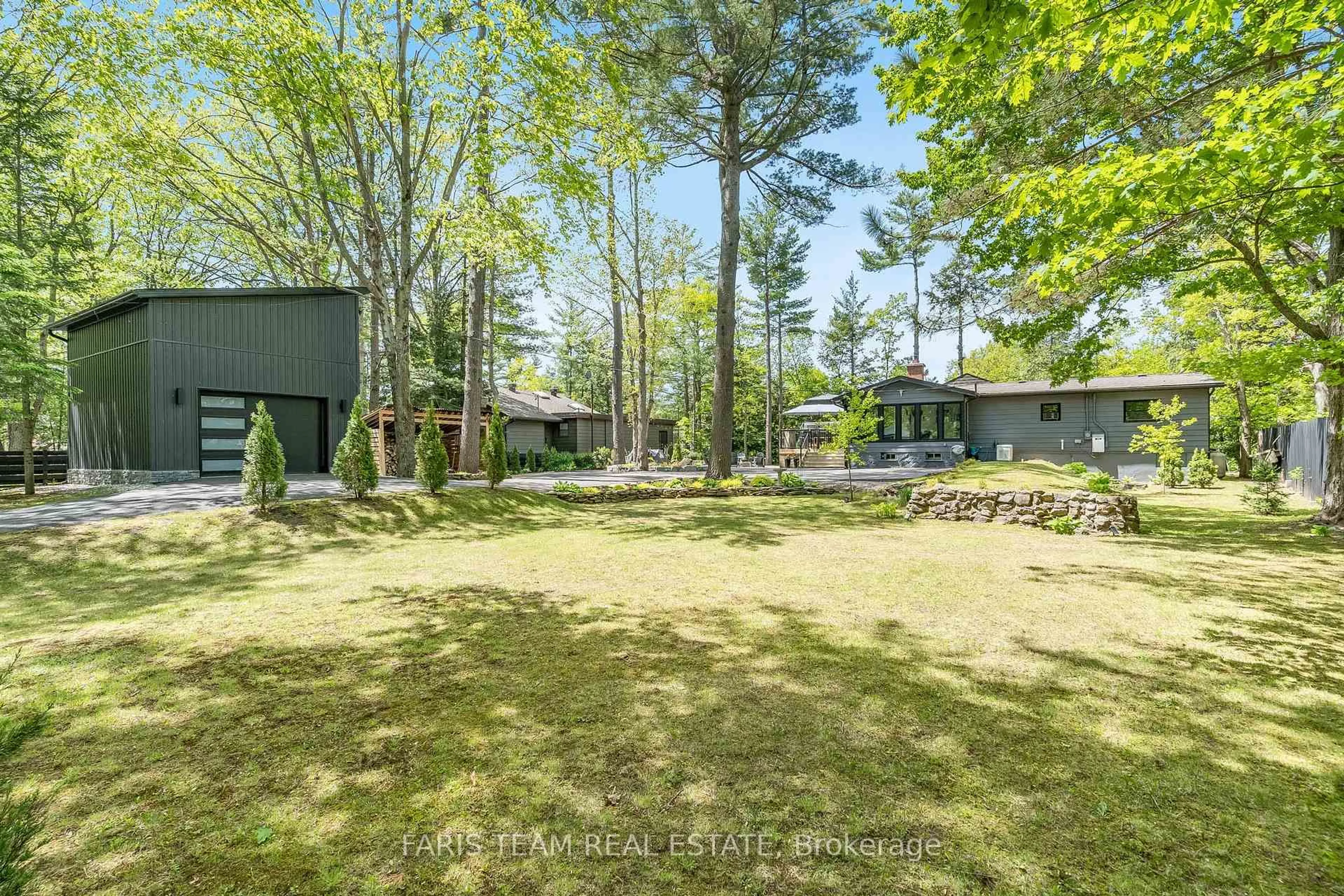 A pic from outside/outdoor area/front of a property/back of a property/a pic from drone, forest/trees view for 7672 Birch Dr, Ramara Ontario L0K 2B0