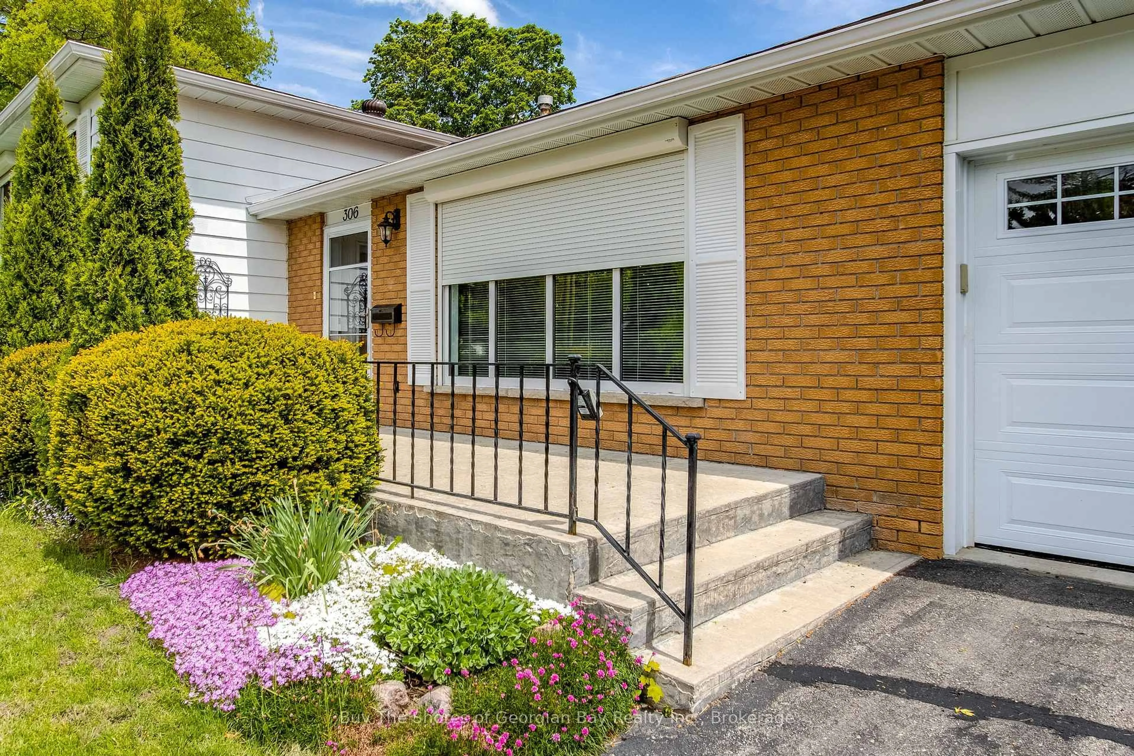 Home with brick exterior material, street for 306 Cedar St, Midland Ontario L4R 4M2