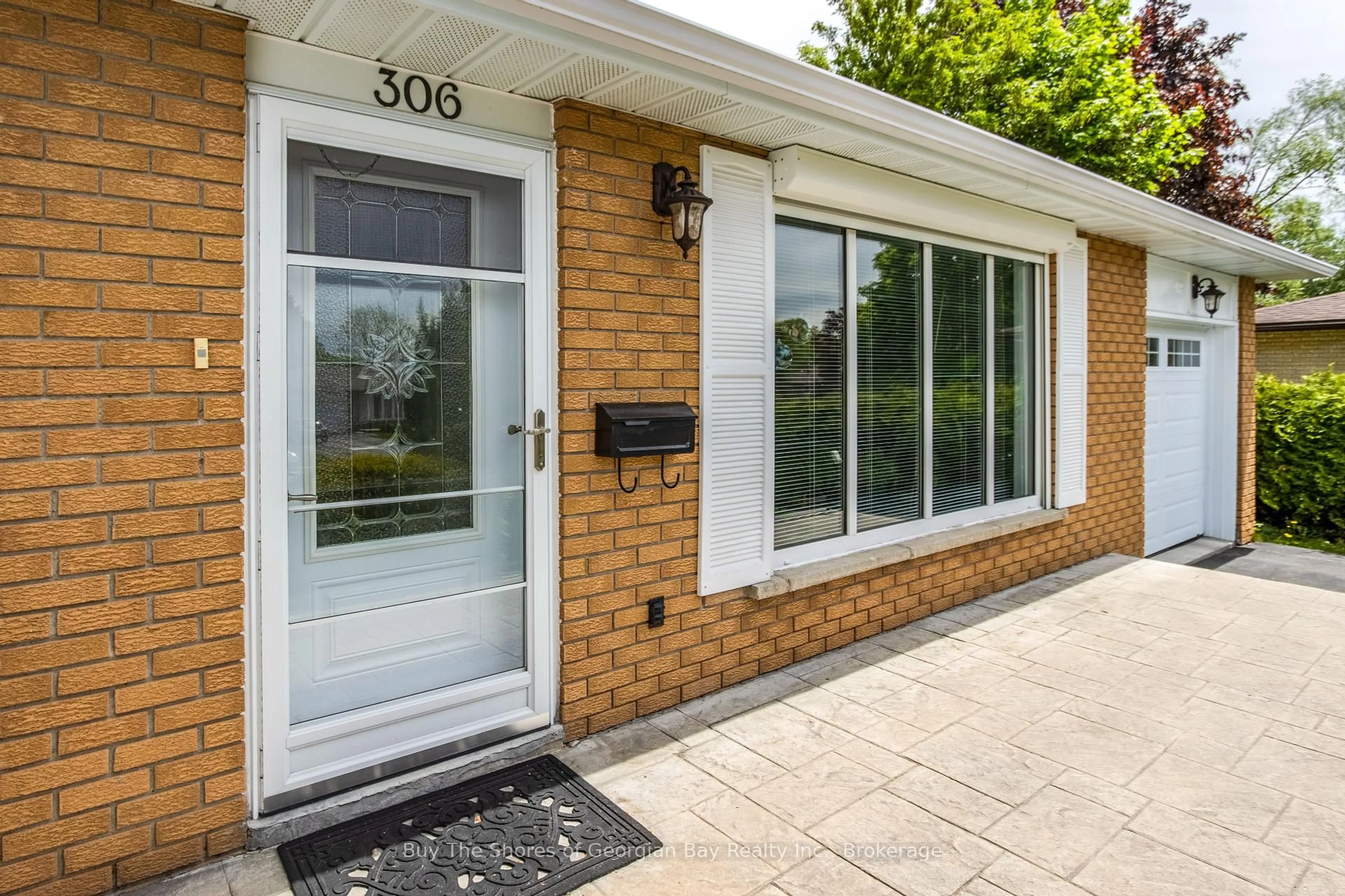 Home with brick exterior material, street for 306 Cedar St, Midland Ontario L4R 4M2