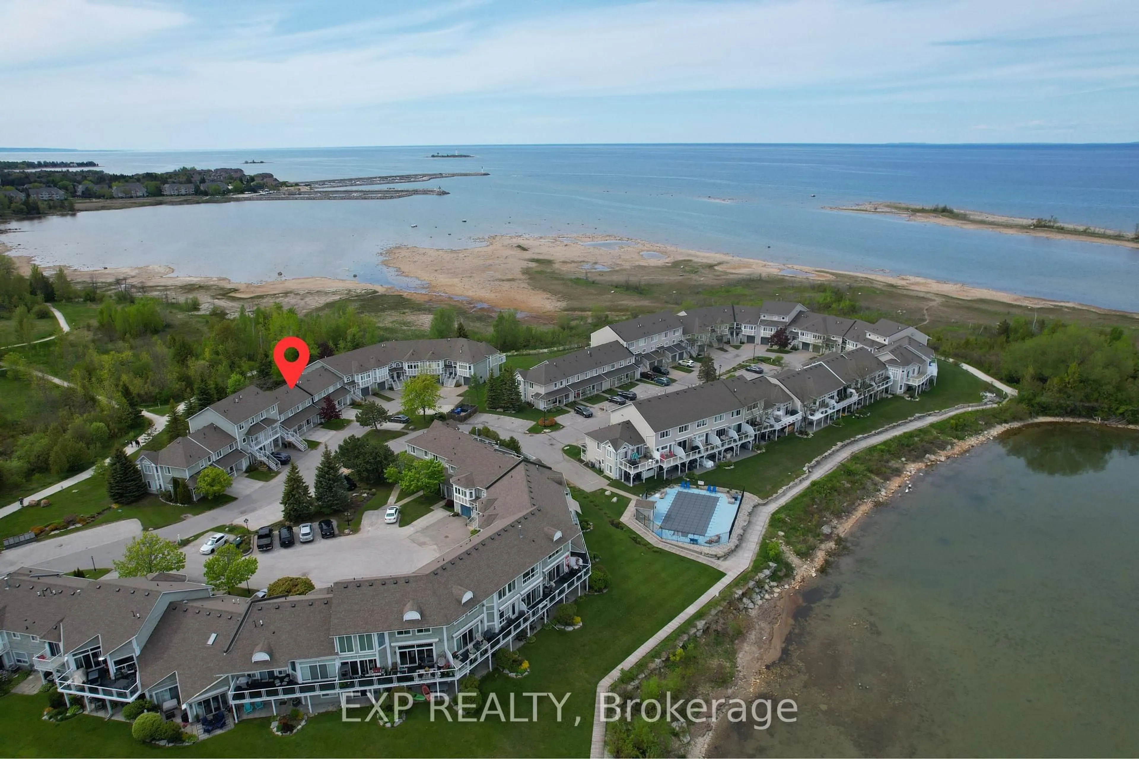 A pic from outside/outdoor area/front of a property/back of a property/a pic from drone, water/lake/river/ocean view for 22 Cranberry Surf N/A, Collingwood Ontario L9Y 5C4