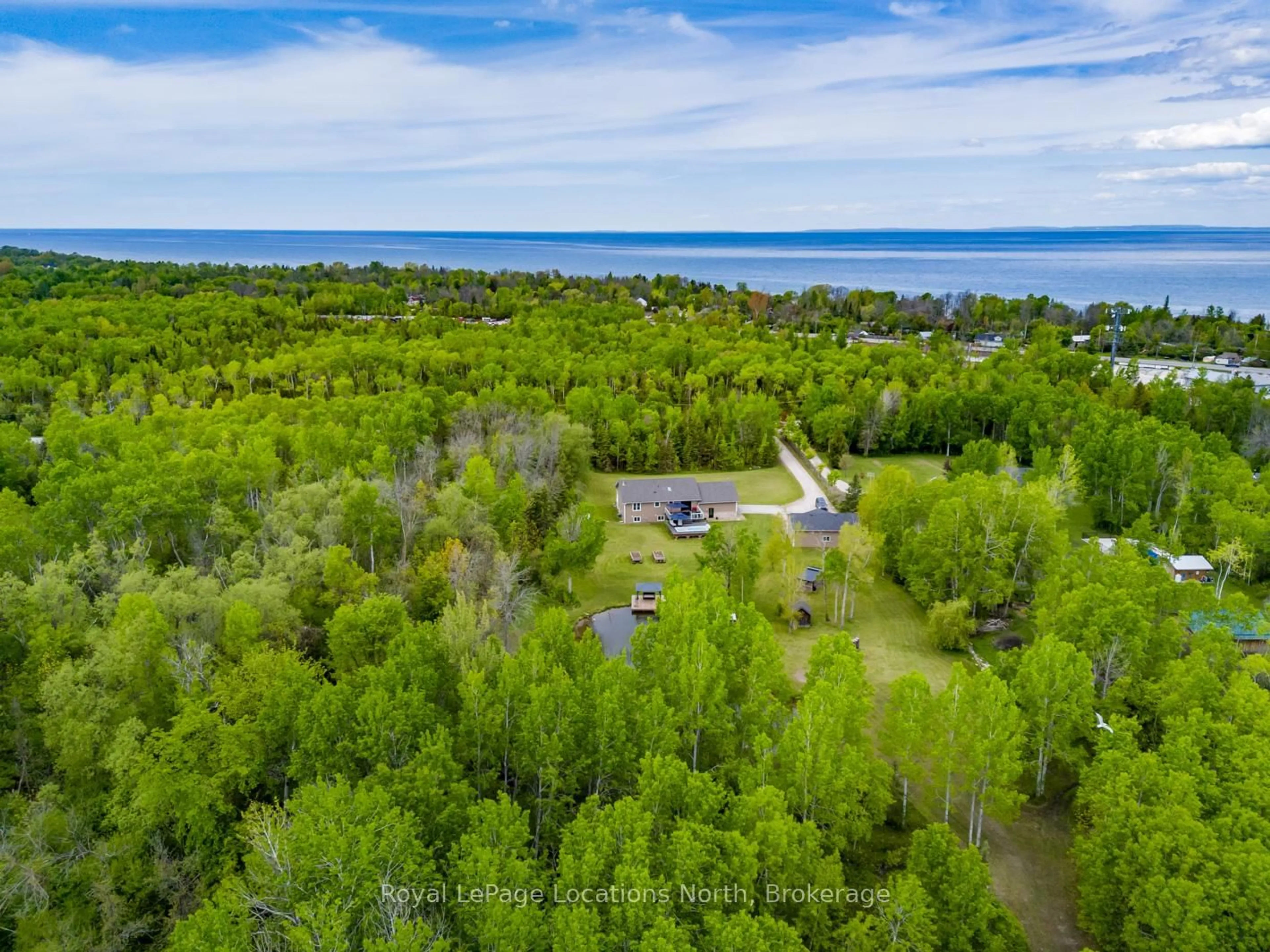 A pic from outside/outdoor area/front of a property/back of a property/a pic from drone, water/lake/river/ocean view for 48 Toner St, Collingwood Ontario L0M 1S0