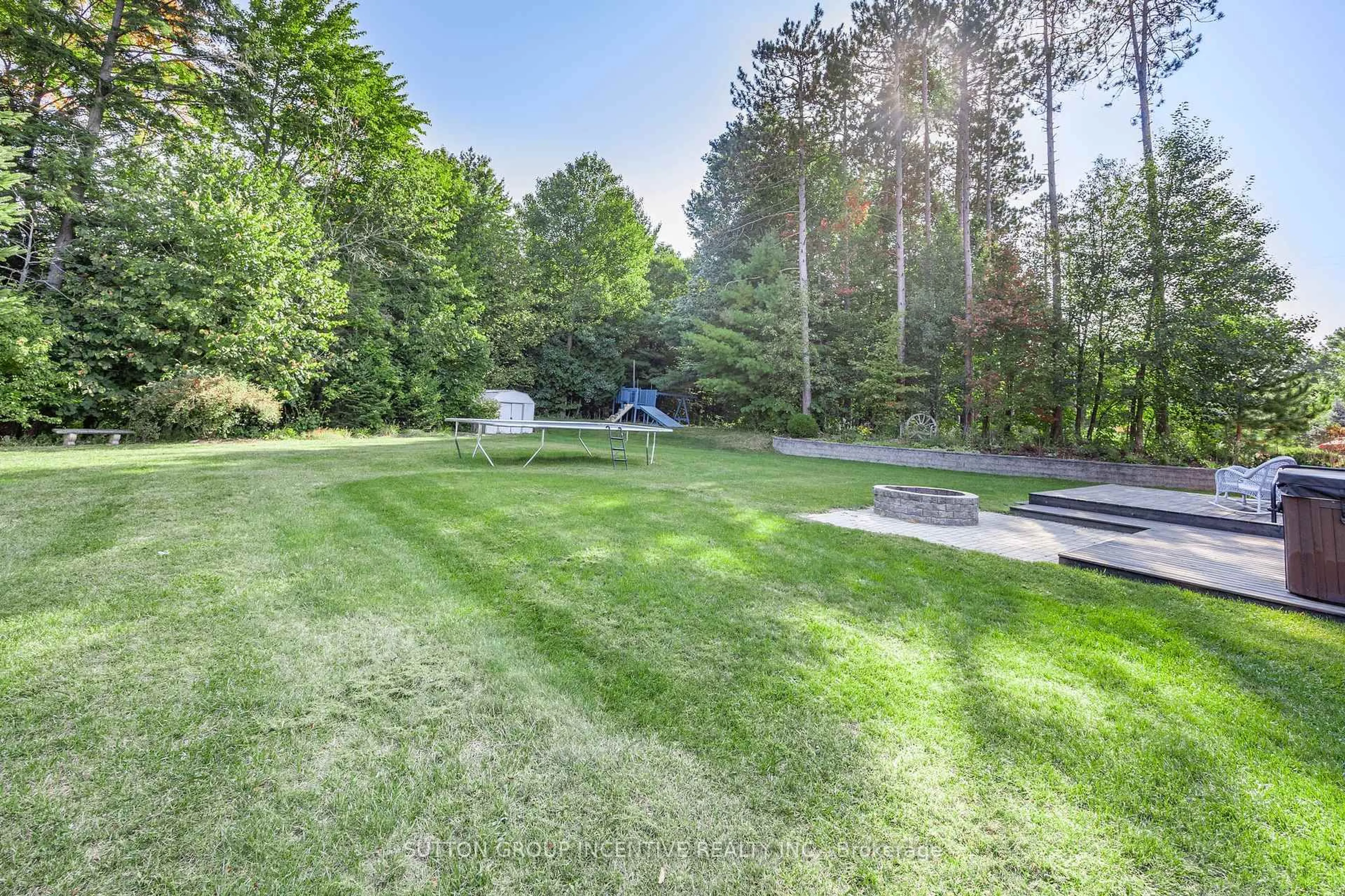 Patio, forest/trees view for 38 Lilac Lane, Springwater Ontario L9X 0N4