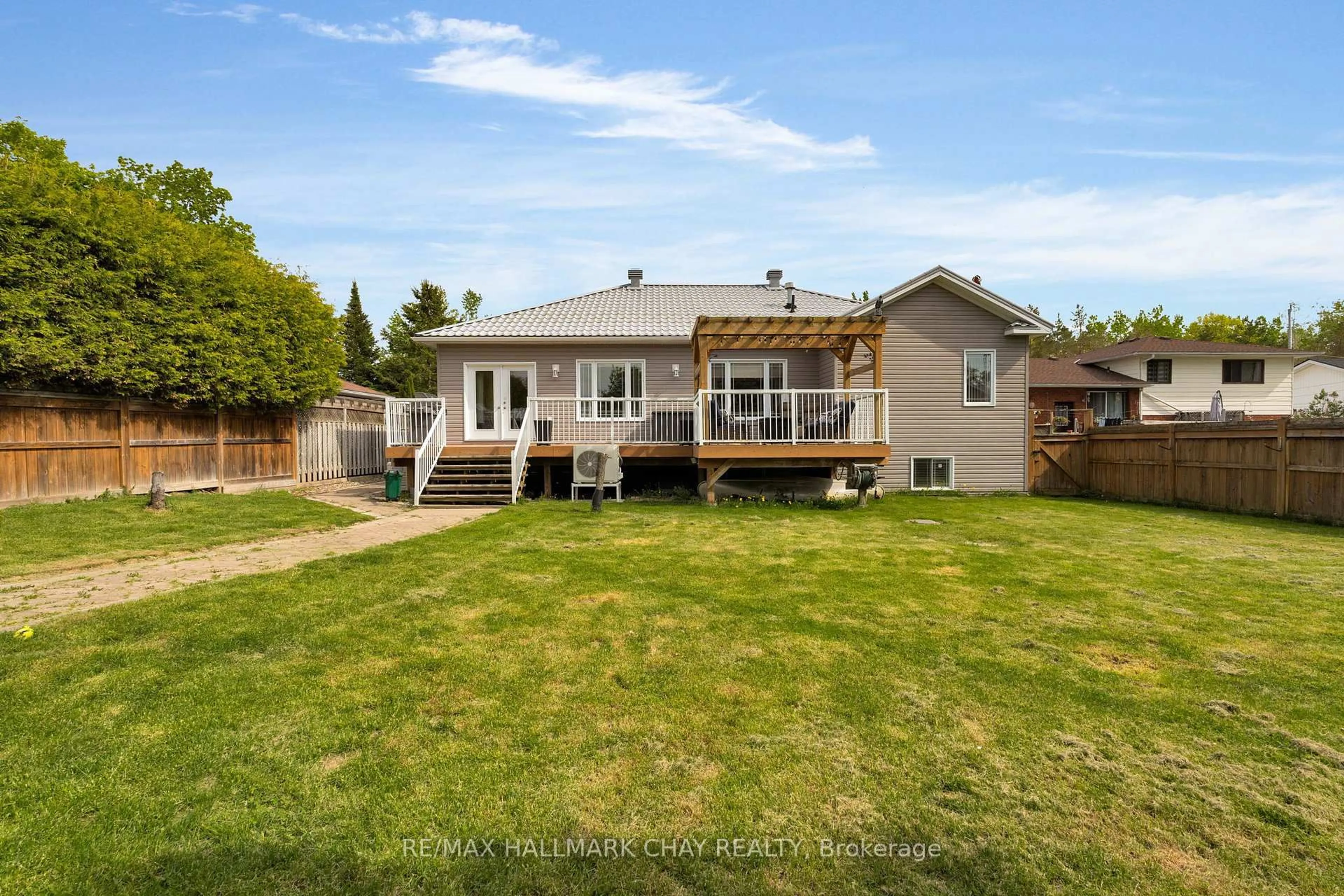A pic from outside/outdoor area/front of a property/back of a property/a pic from drone, water/lake/river/ocean view for 24 MCKENZIE St, Tiny Ontario L0L 2T0