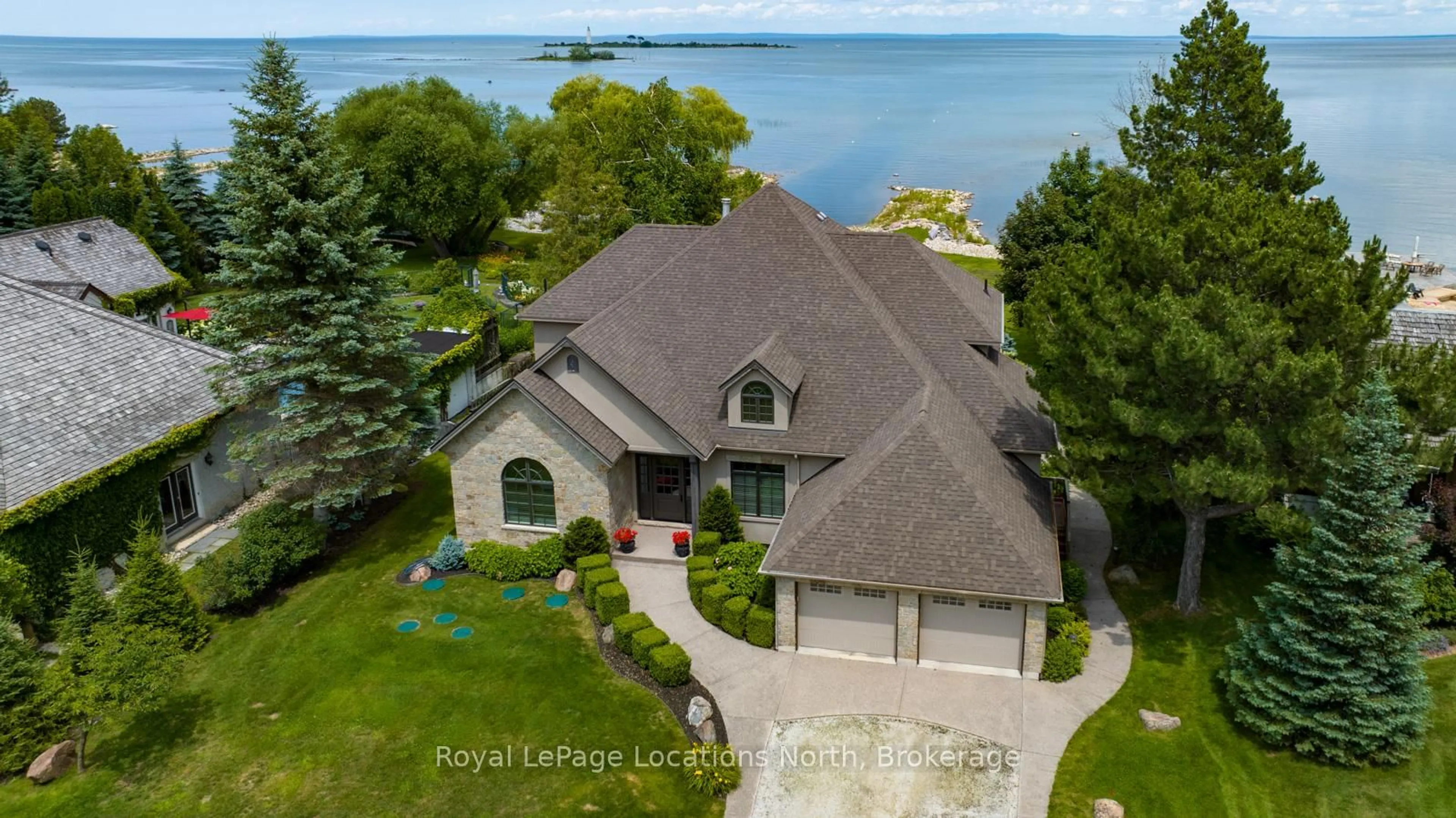 A pic from outside/outdoor area/front of a property/back of a property/a pic from drone, water/lake/river/ocean view for 144 Princeton Shores Blvd, Collingwood Ontario L9Y 5E1