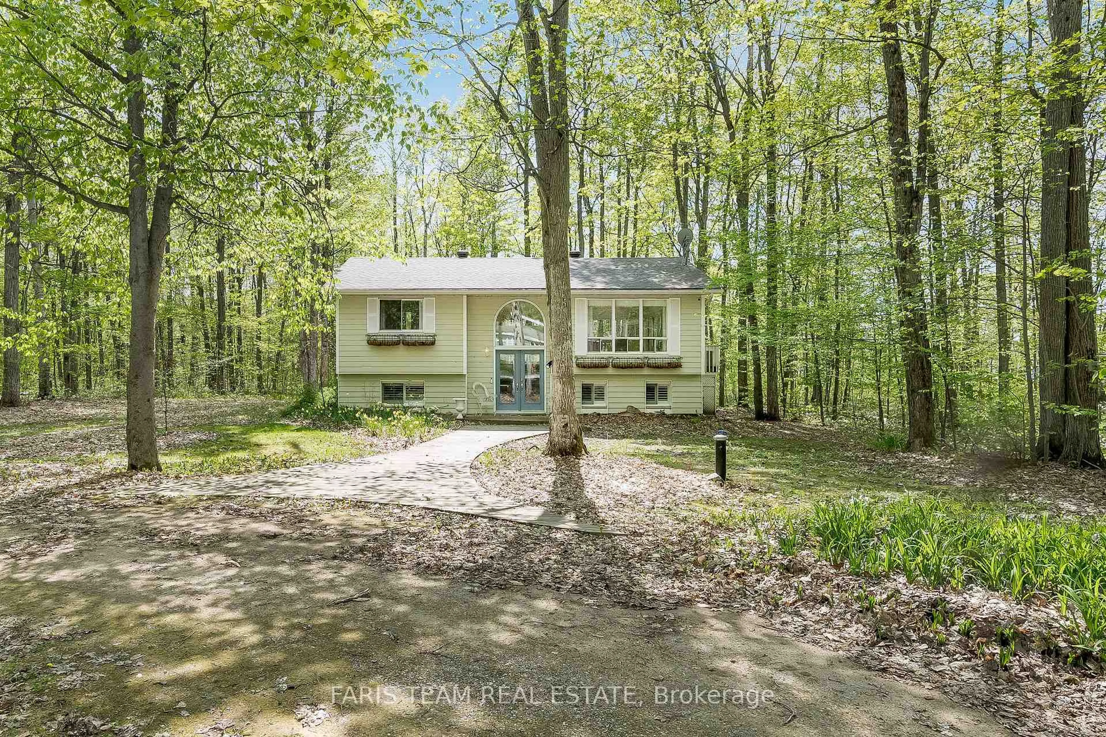 A pic from outside/outdoor area/front of a property/back of a property/a pic from drone, forest/trees view for 104 Silver Birch Dr, Tiny Ontario L9M 0M6