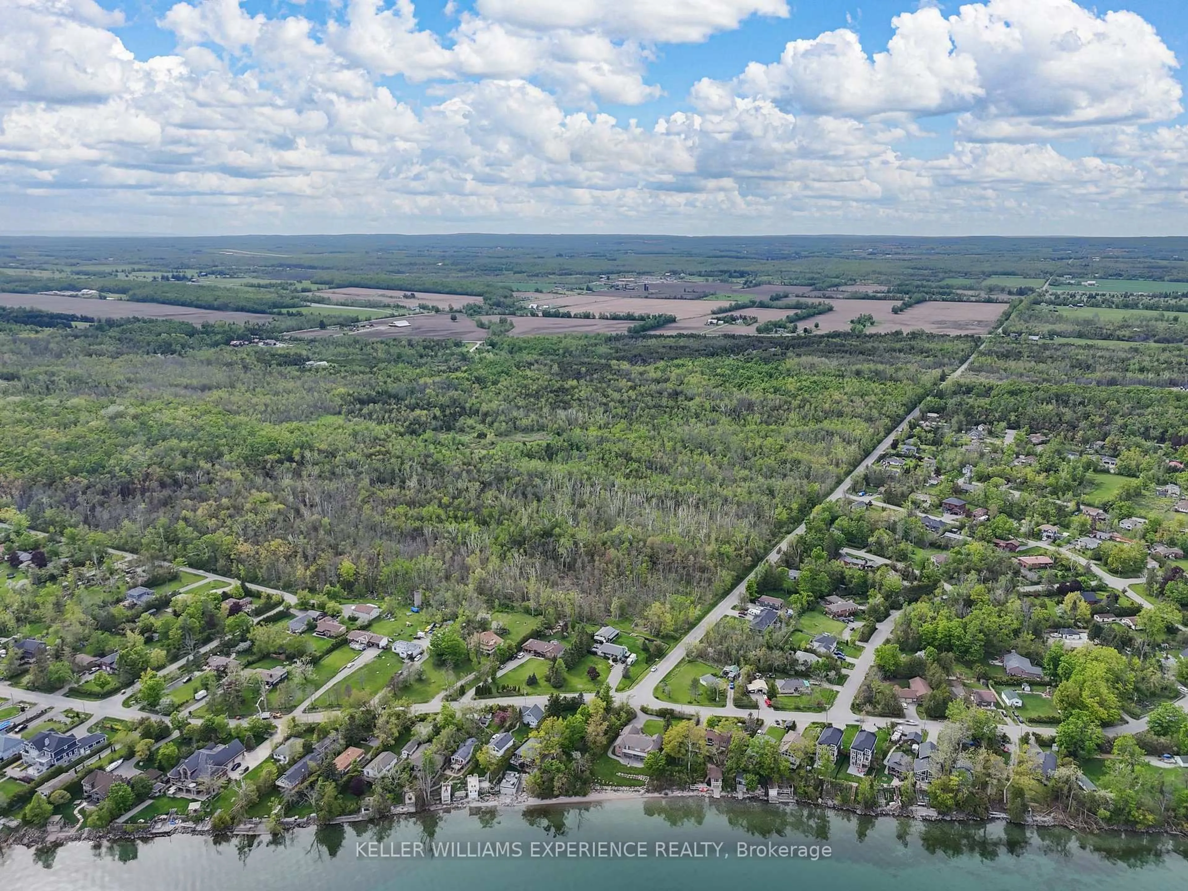 A pic from outside/outdoor area/front of a property/back of a property/a pic from drone, water/lake/river/ocean view for 552 10 Line, Oro-Medonte Ontario L0L 1T0