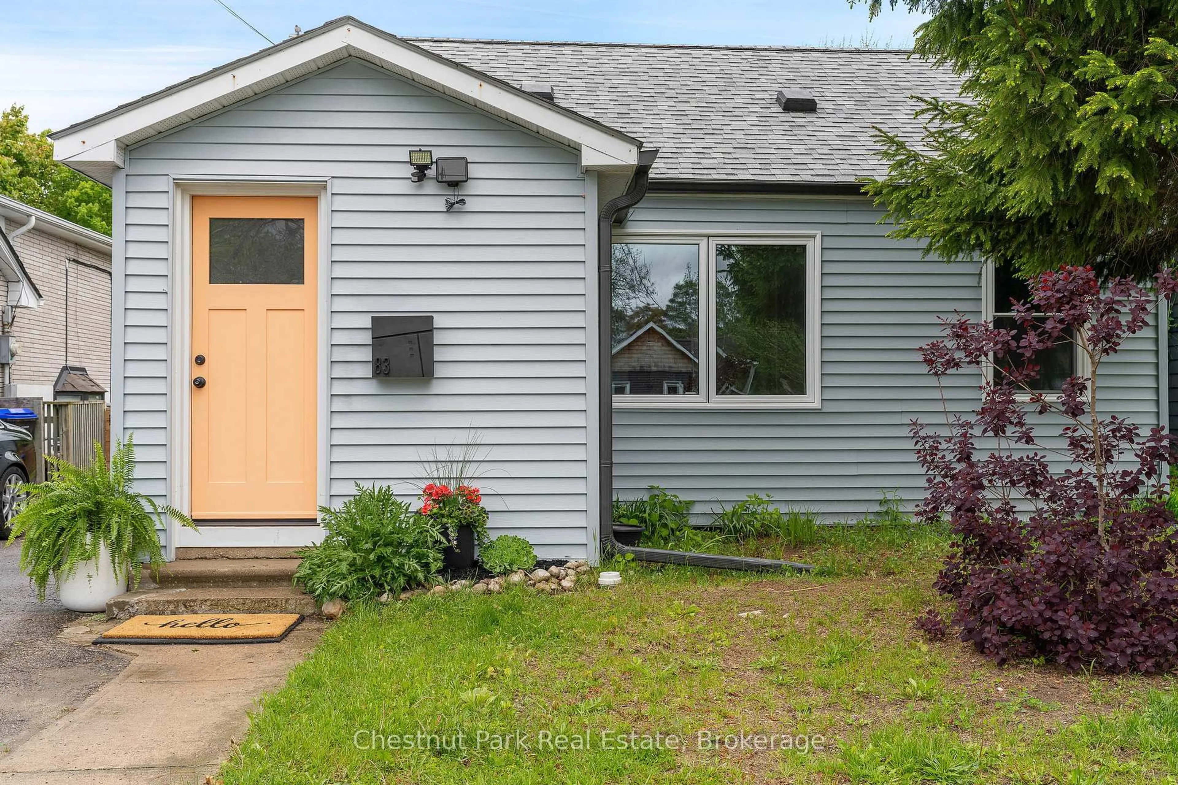 Home with vinyl exterior material, street for 83 Ninth St, Collingwood Ontario L9Y 2G3