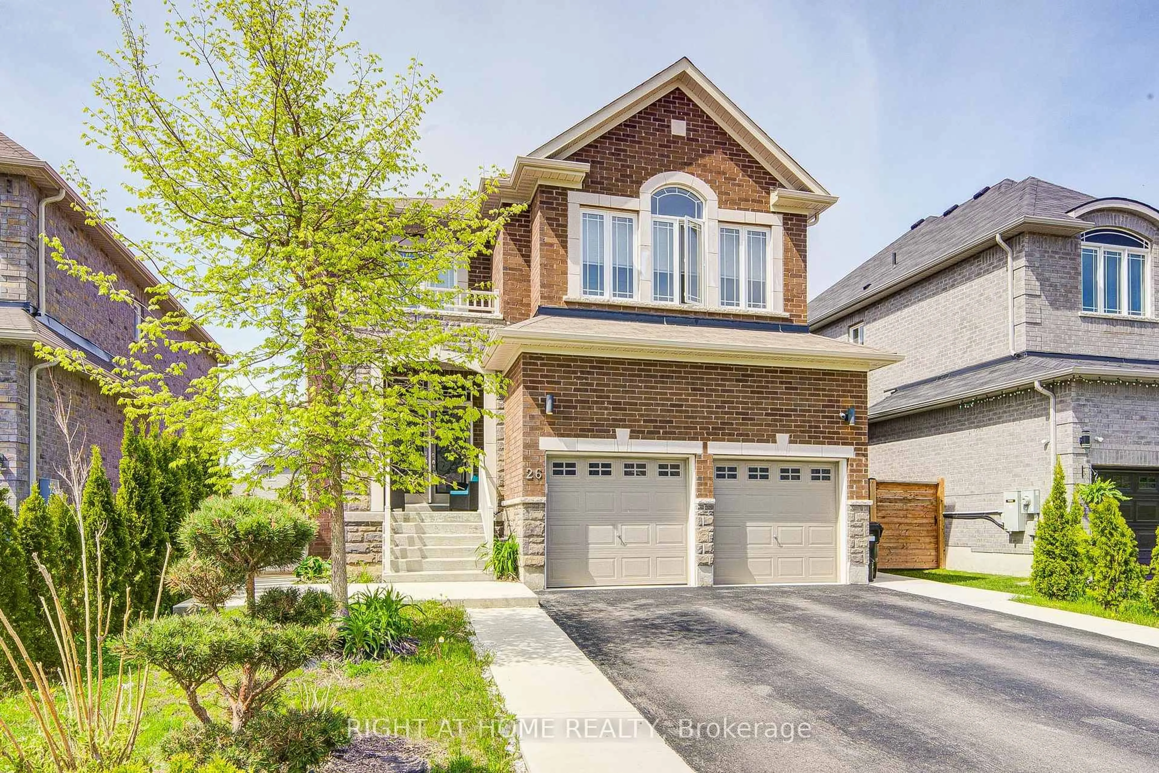 Home with brick exterior material, street for 26 Pearl St, Wasaga Beach Ontario L9Z 1J6