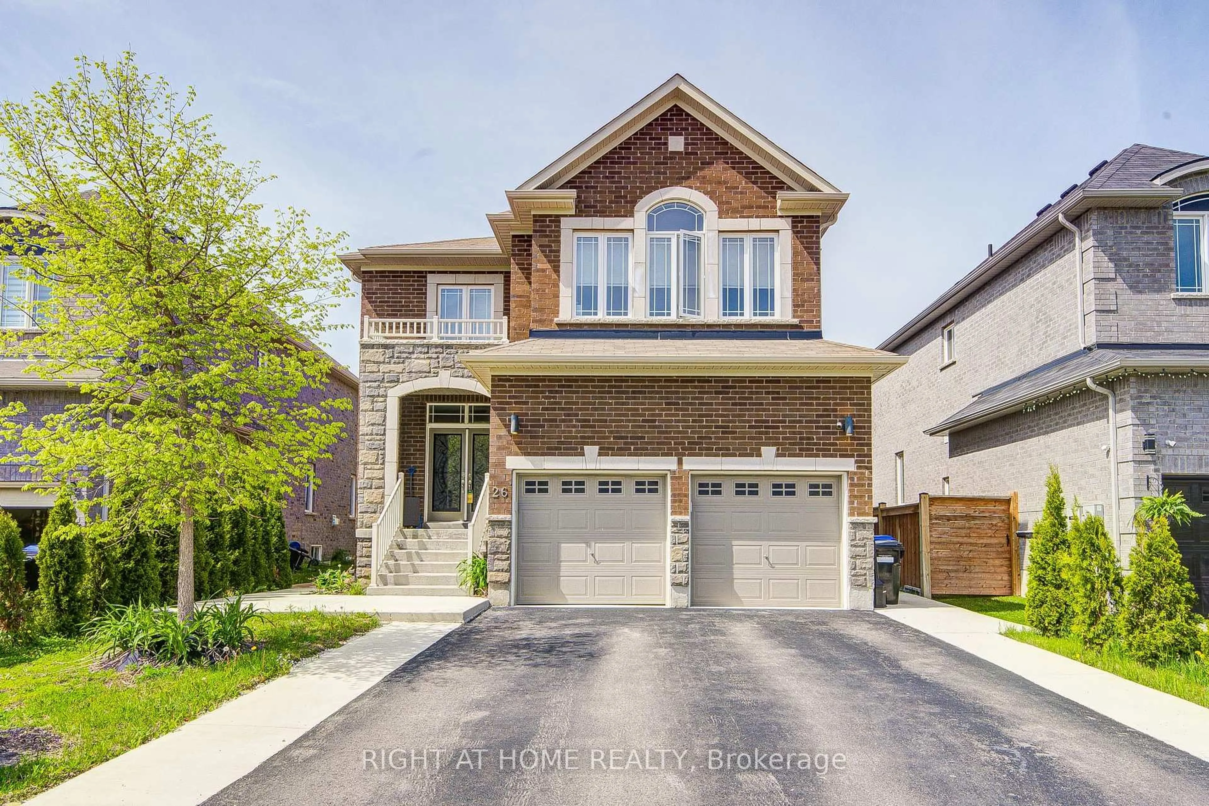 Home with brick exterior material, street for 26 Pearl St, Wasaga Beach Ontario L9Z 1J6