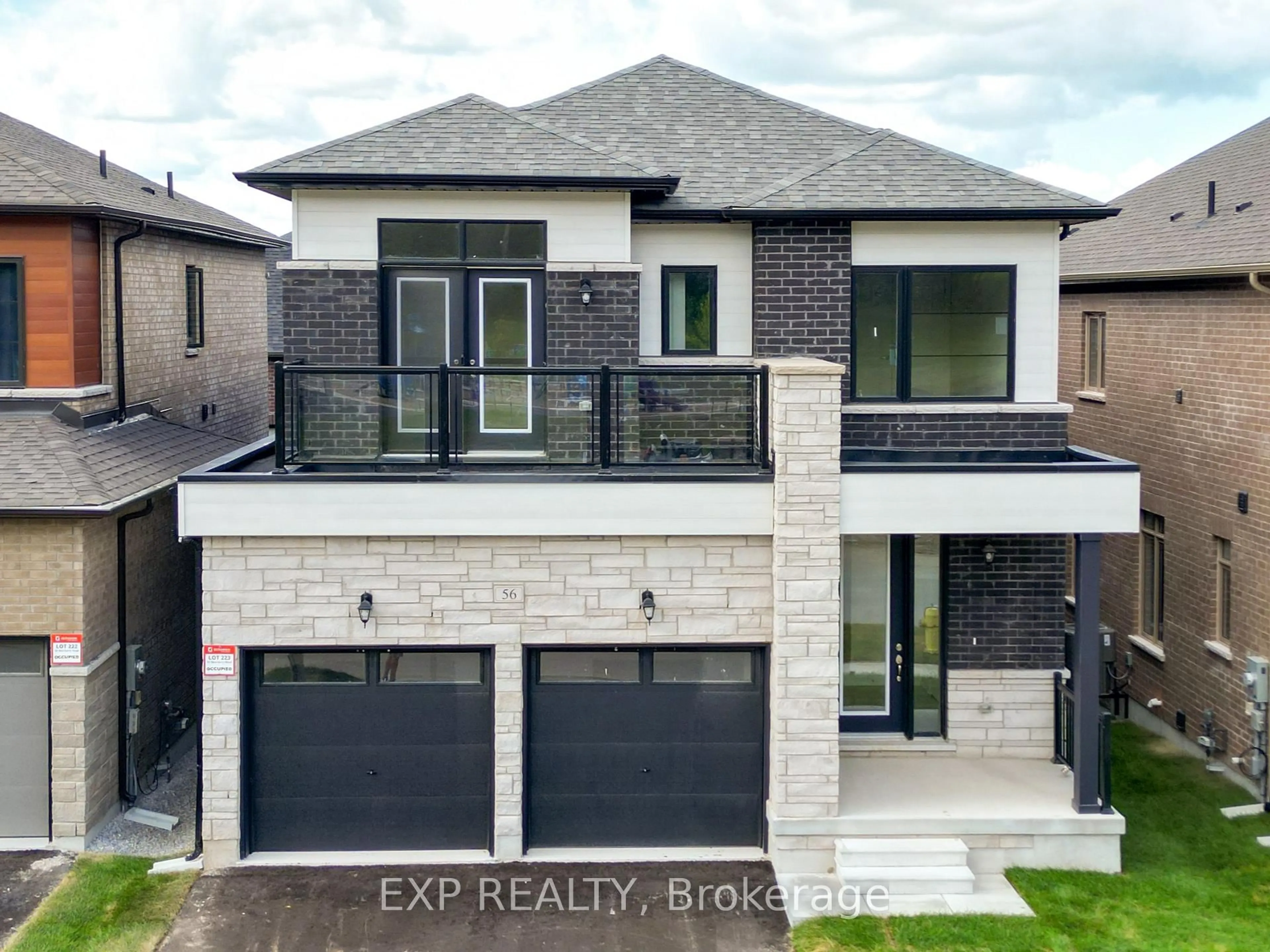 Home with brick exterior material, street for 56 Bearberry Rd, Springwater Ontario L0L 1Y3