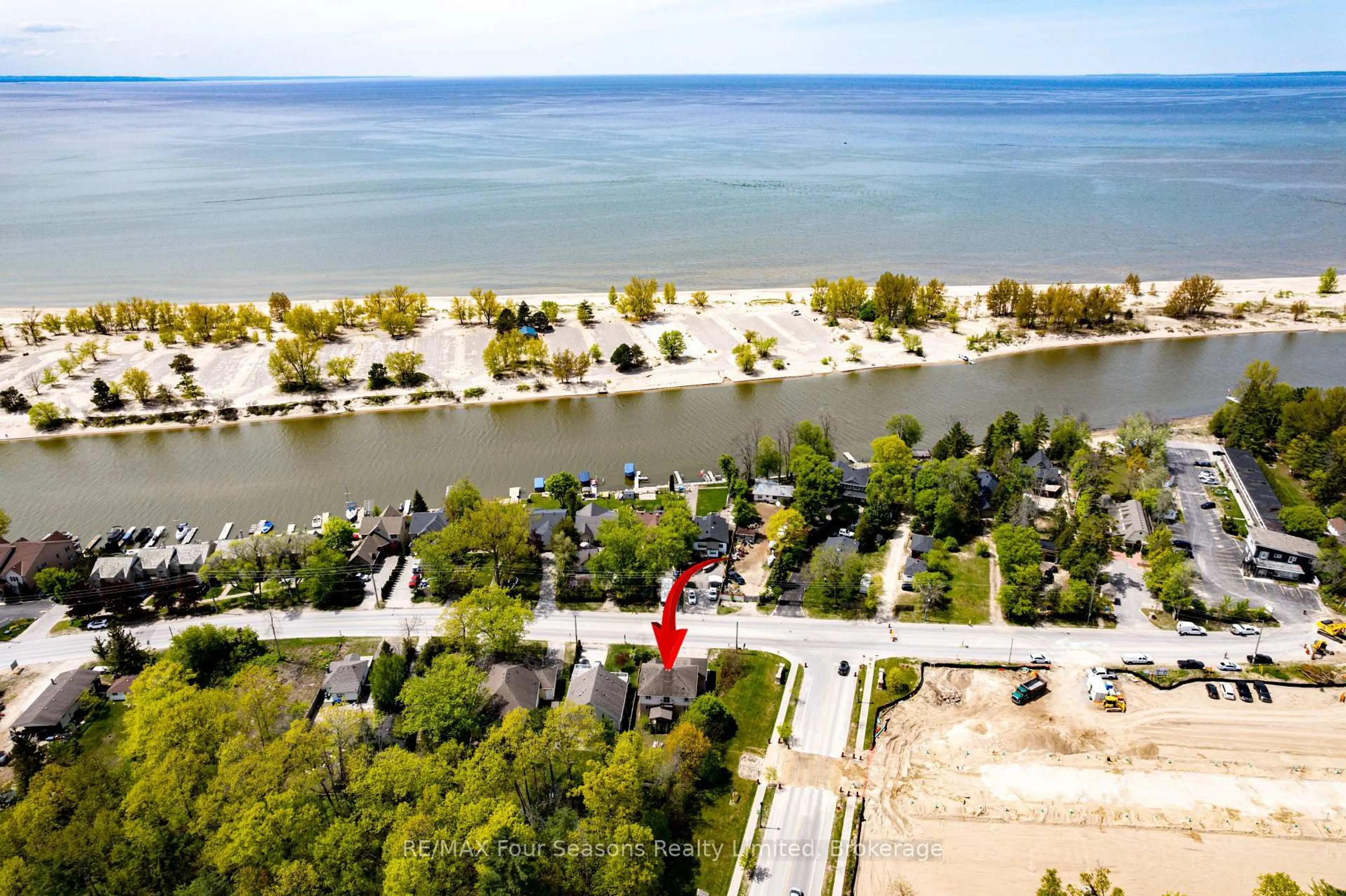 A pic from outside/outdoor area/front of a property/back of a property/a pic from drone, water/lake/river/ocean view for 243 River Rd, Wasaga Beach Ontario L9Z 2L1