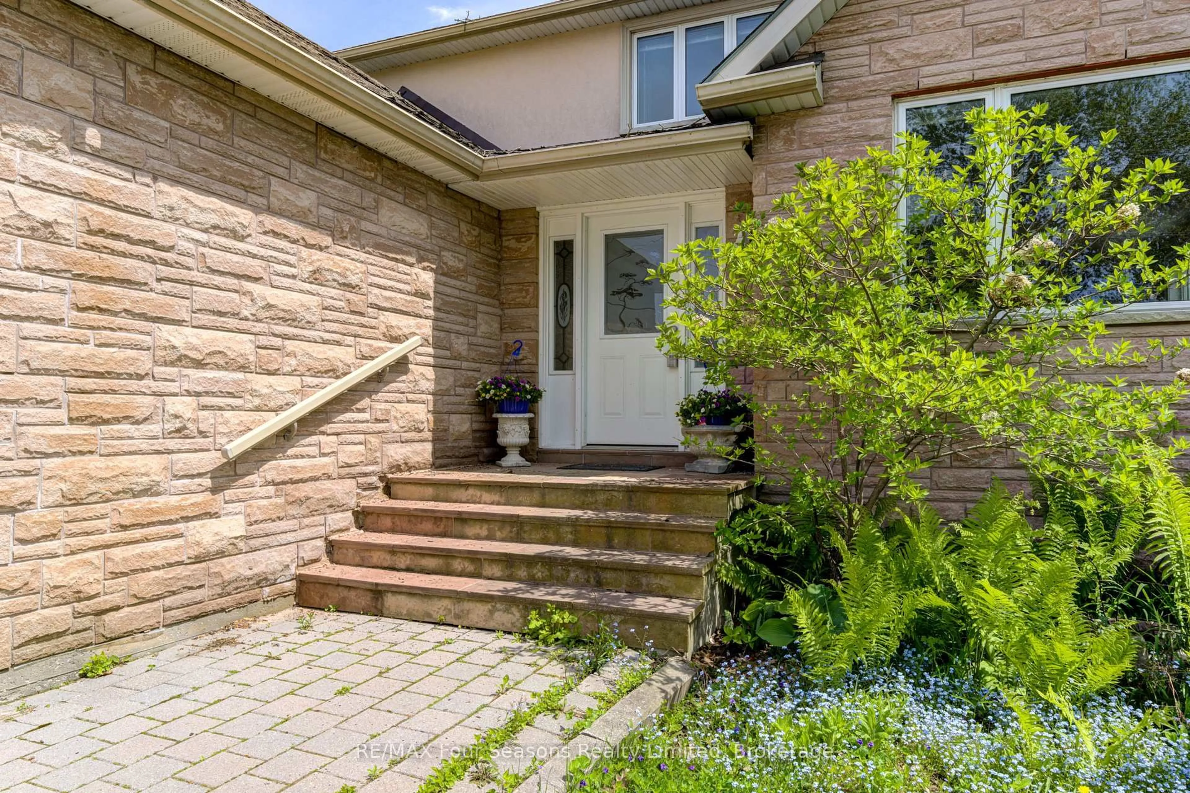 Home with brick exterior material, street for 243 River Rd, Wasaga Beach Ontario L9Z 2L1