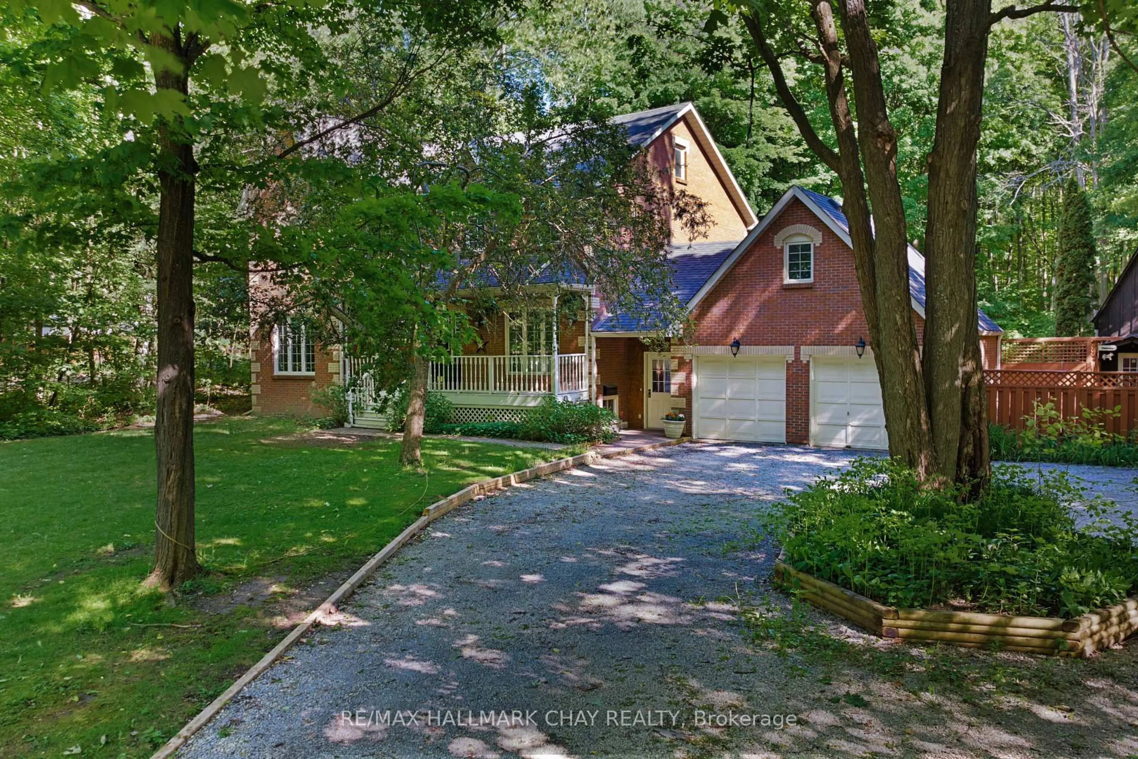 A pic from outside/outdoor area/front of a property/back of a property/a pic from drone, street for 1311 Snow Valley Rd, Springwater Ontario L9X 1K2