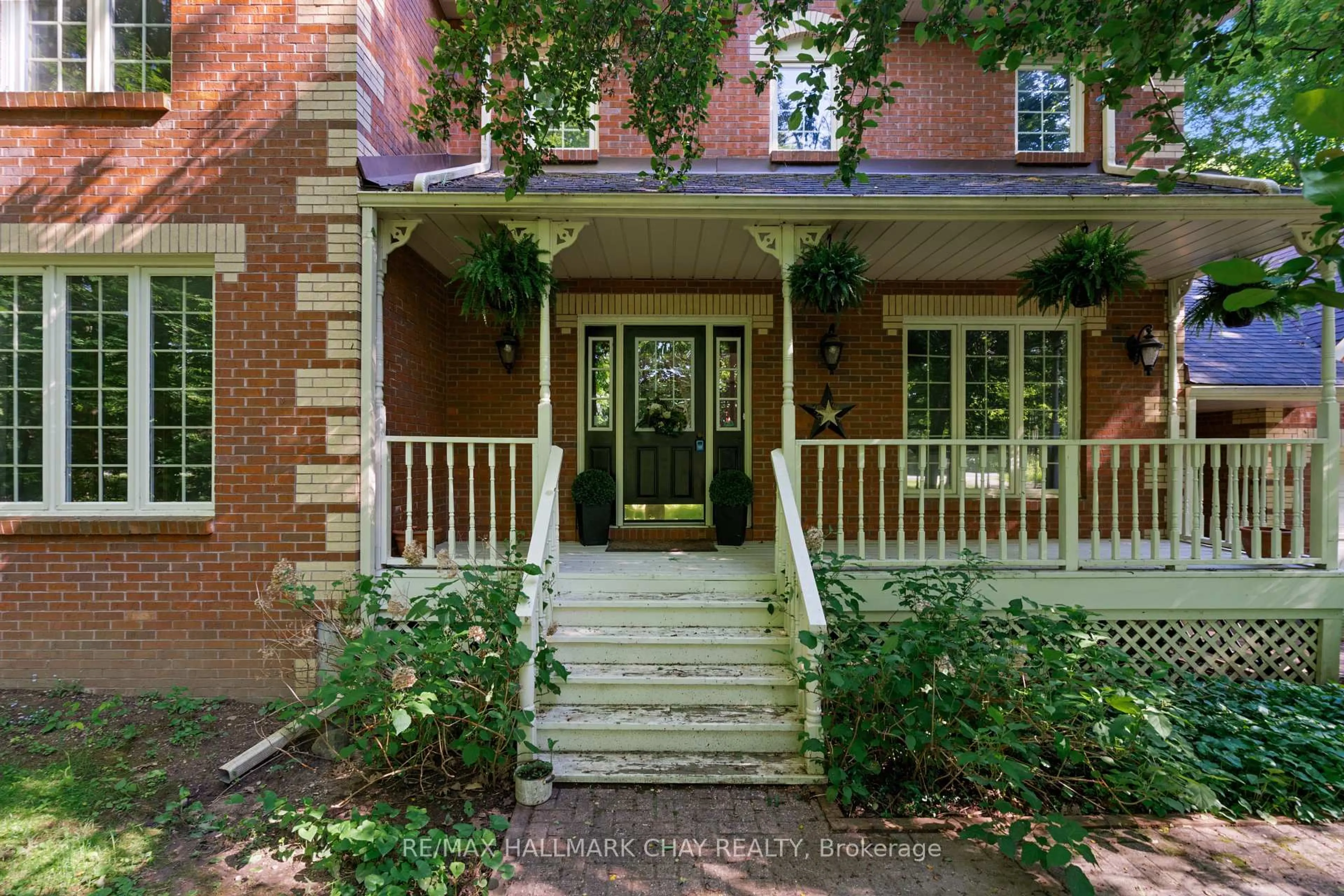 Home with brick exterior material, street for 1311 Snow Valley Rd, Springwater Ontario L9X 1K2