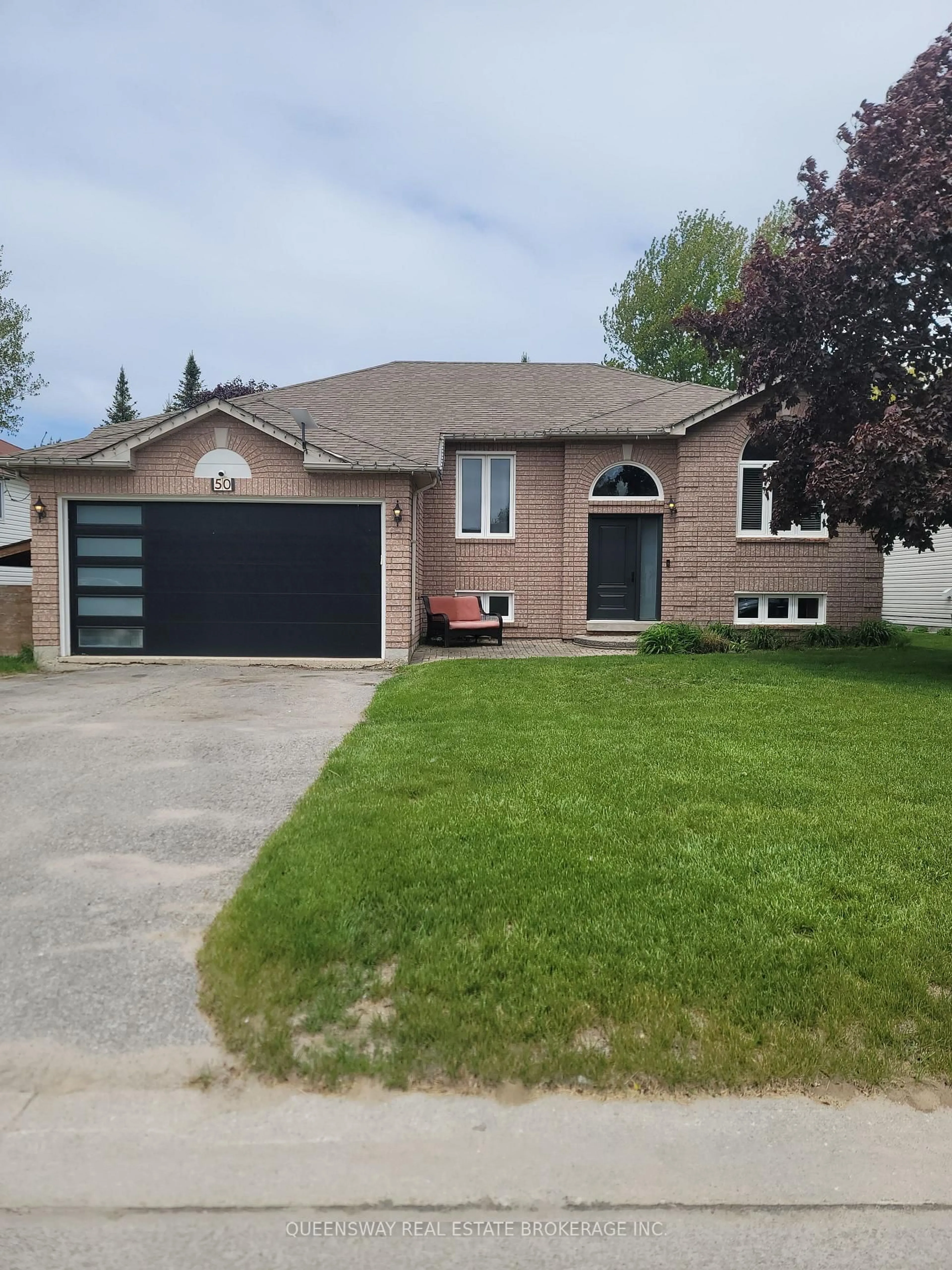 Home with brick exterior material, street for 50 Acorn Cres, Wasaga Beach Ontario L9Z 1L6
