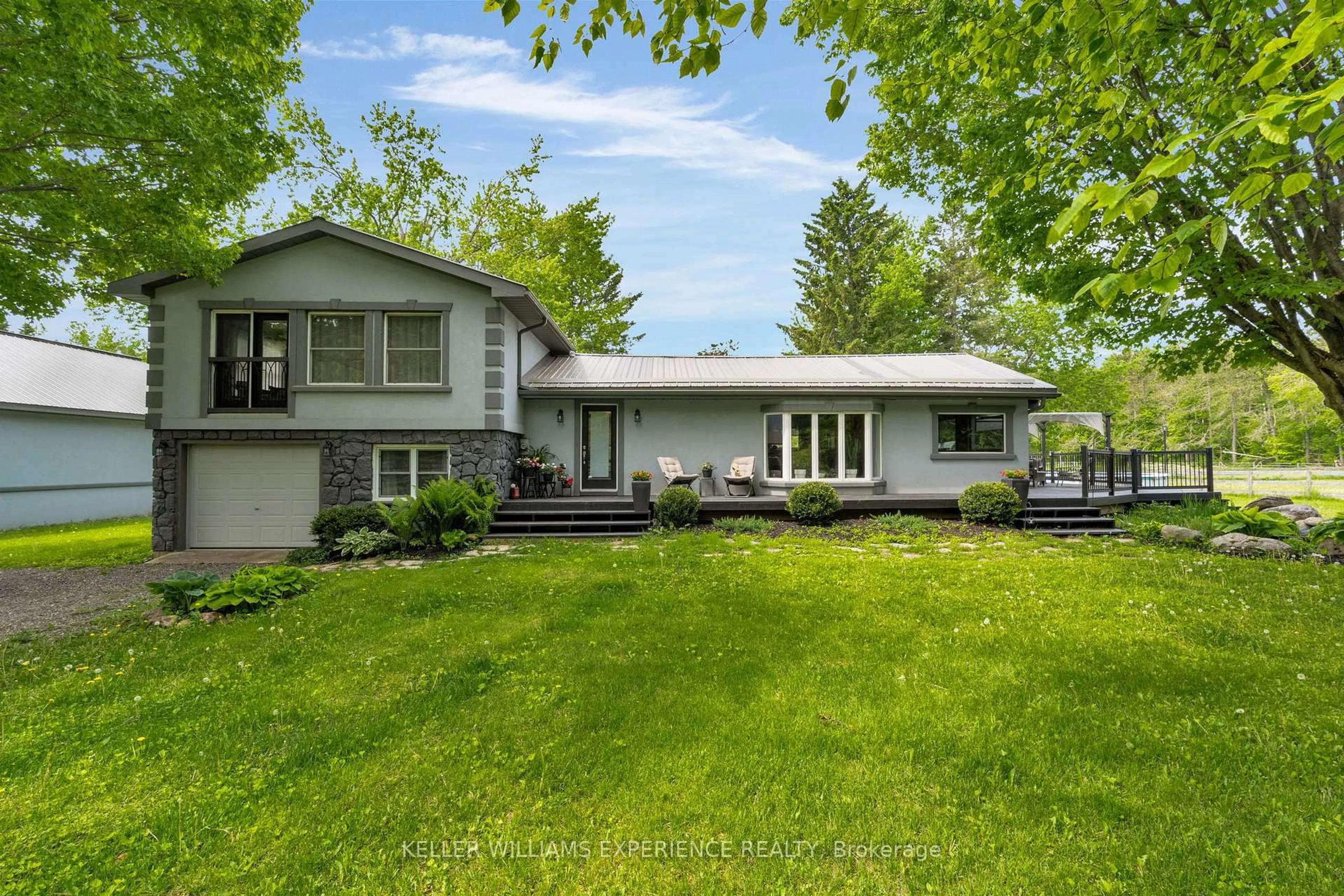 A pic from outside/outdoor area/front of a property/back of a property/a pic from drone, street for 1398 Old Second Rd, Springwater Ontario L0L 2K0