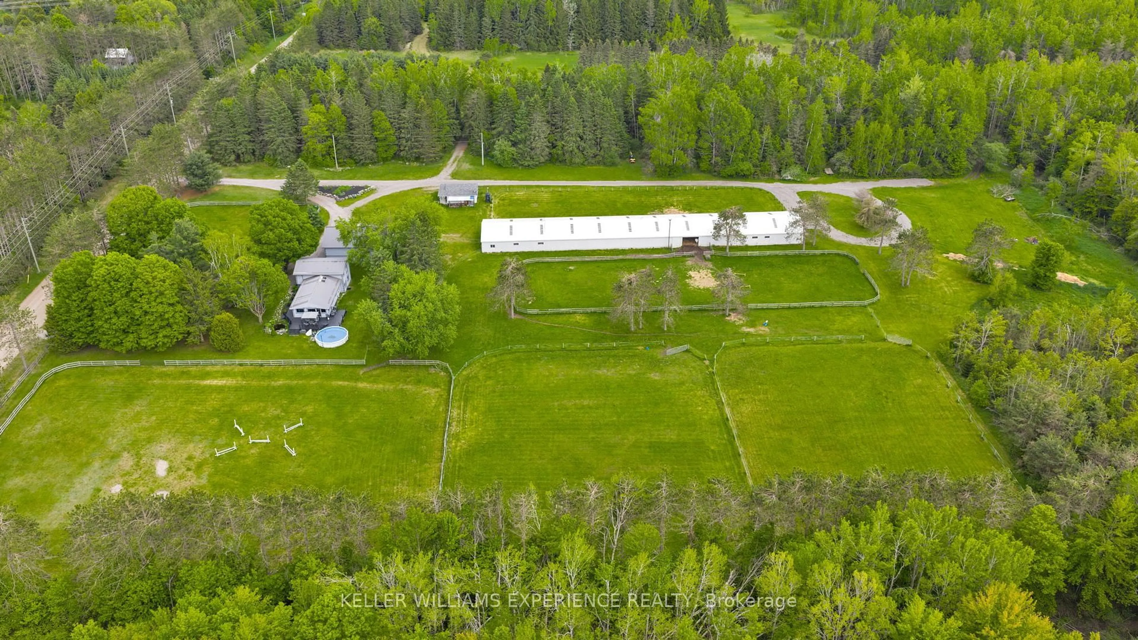 A pic from outside/outdoor area/front of a property/back of a property/a pic from drone, unknown for 1398 Old Second Rd, Springwater Ontario L0L 2K0