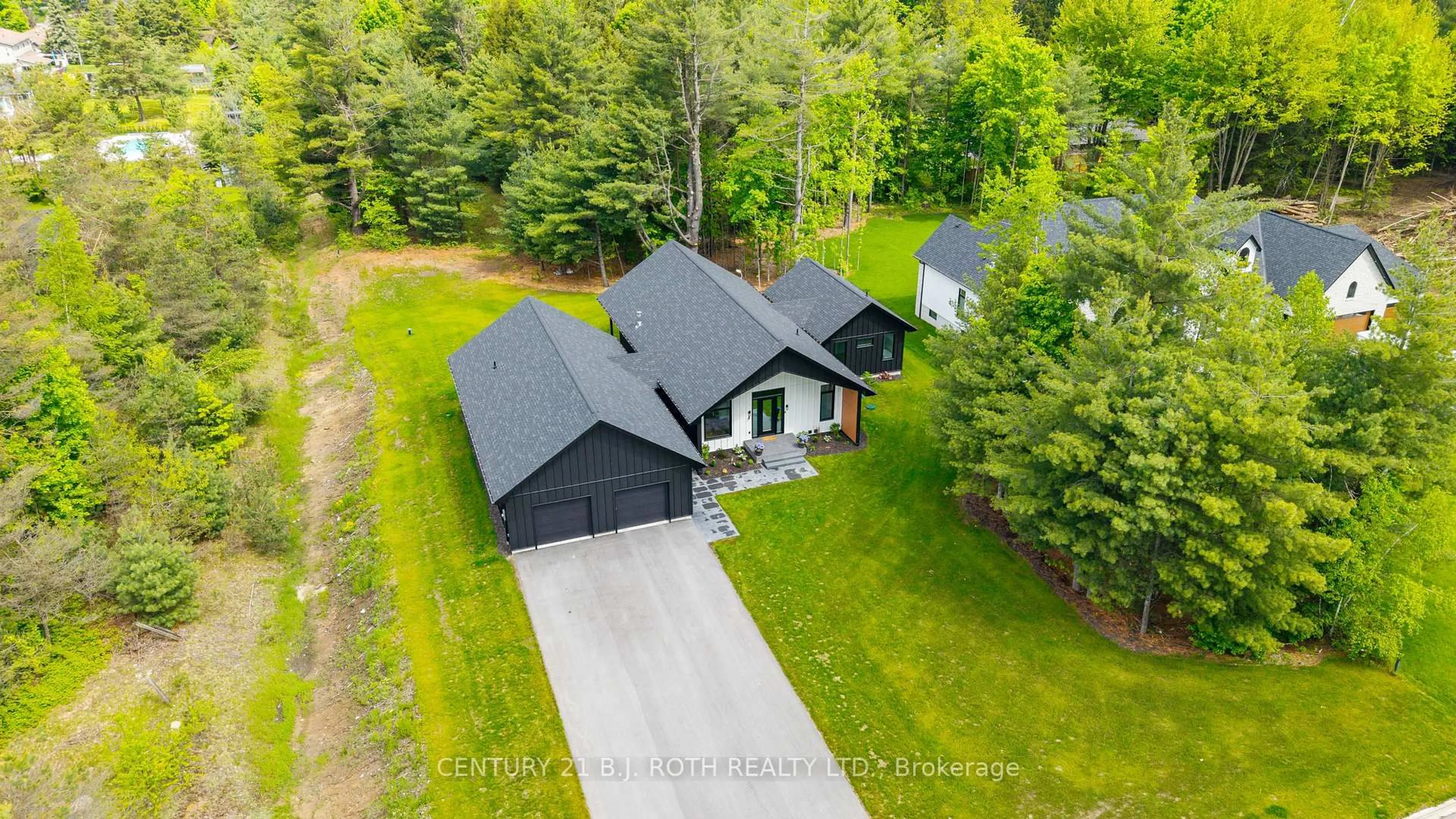 A pic from outside/outdoor area/front of a property/back of a property/a pic from drone, unknown for 31 Marni Lane, Springwater Ontario L0L 2K0