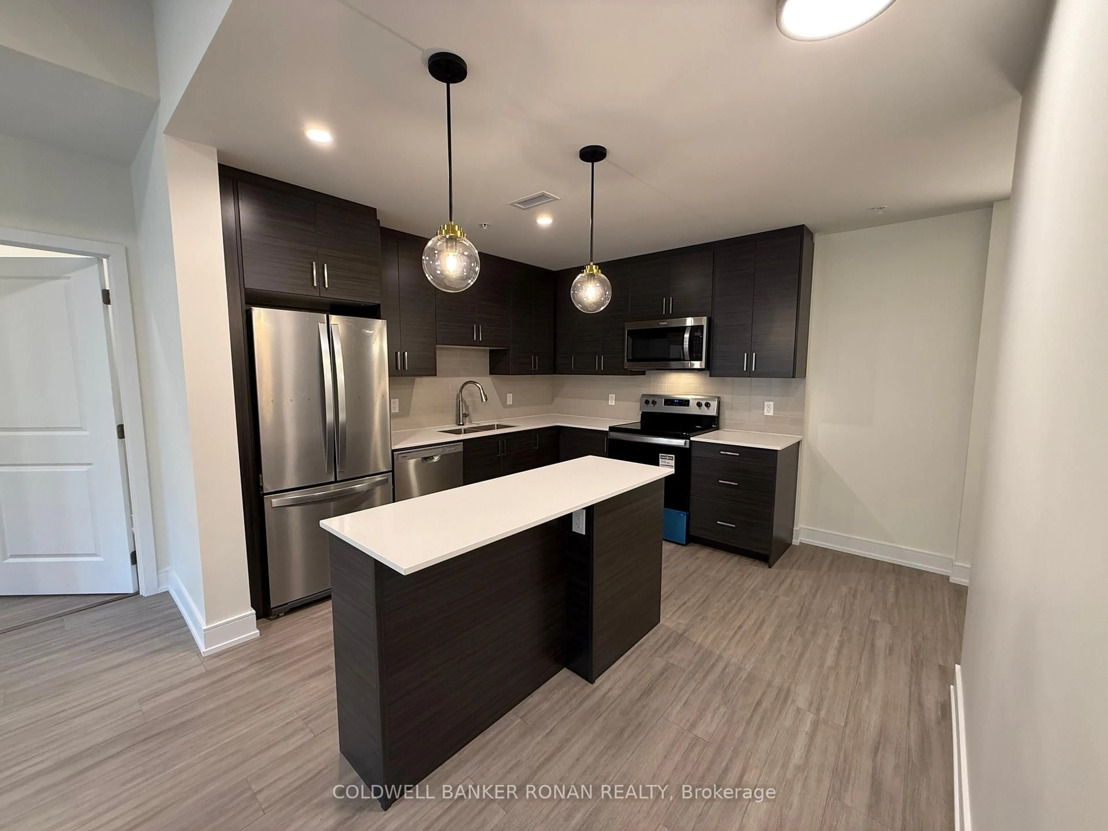 Open concept kitchen, unknown for 121 Mary St #209, Clearview Ontario L0M 1G0