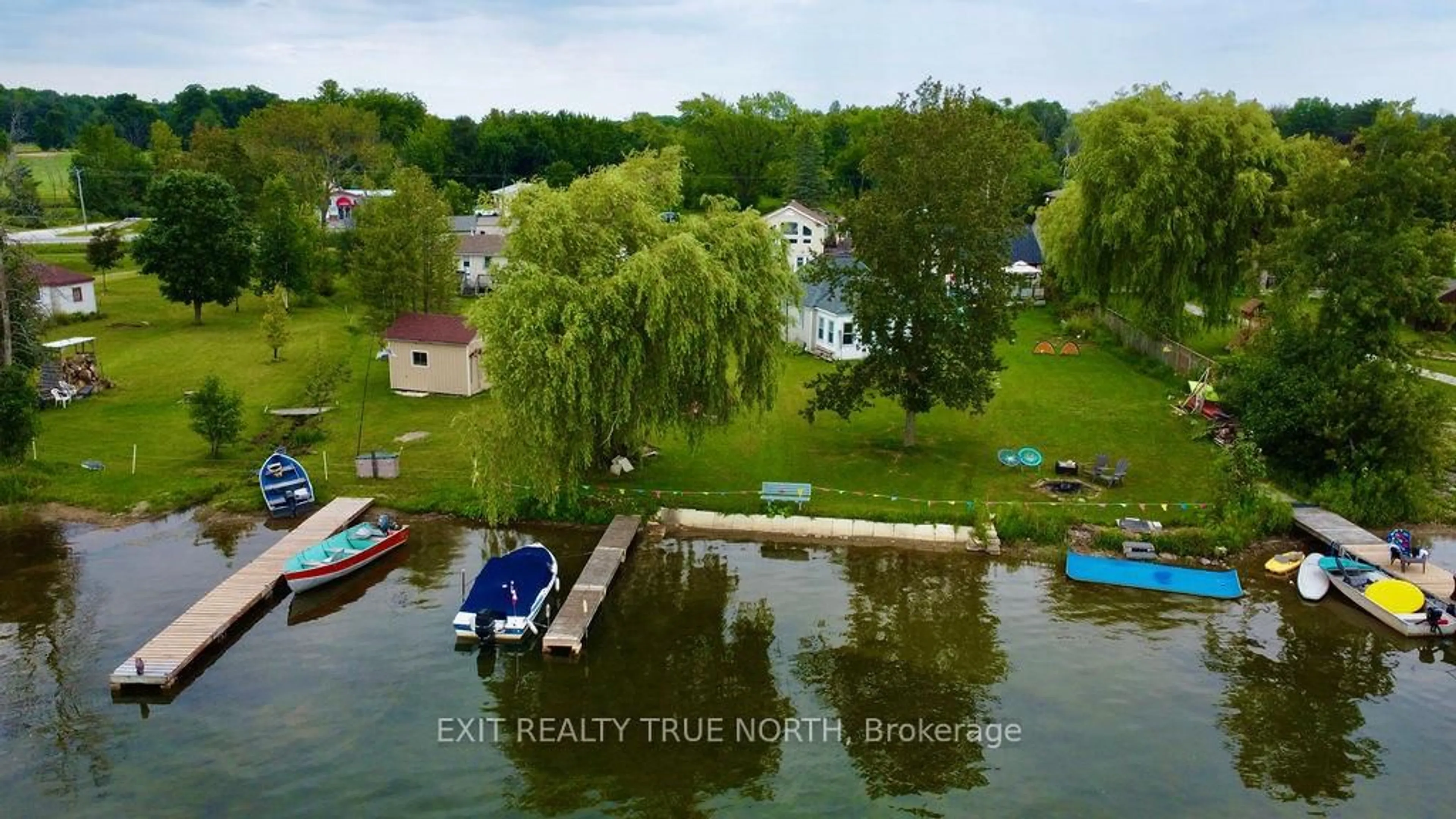 A pic from outside/outdoor area/front of a property/back of a property/a pic from drone, water/lake/river/ocean view for 5632 Penetanguishene Rd, Springwater Ontario L0L 1P0