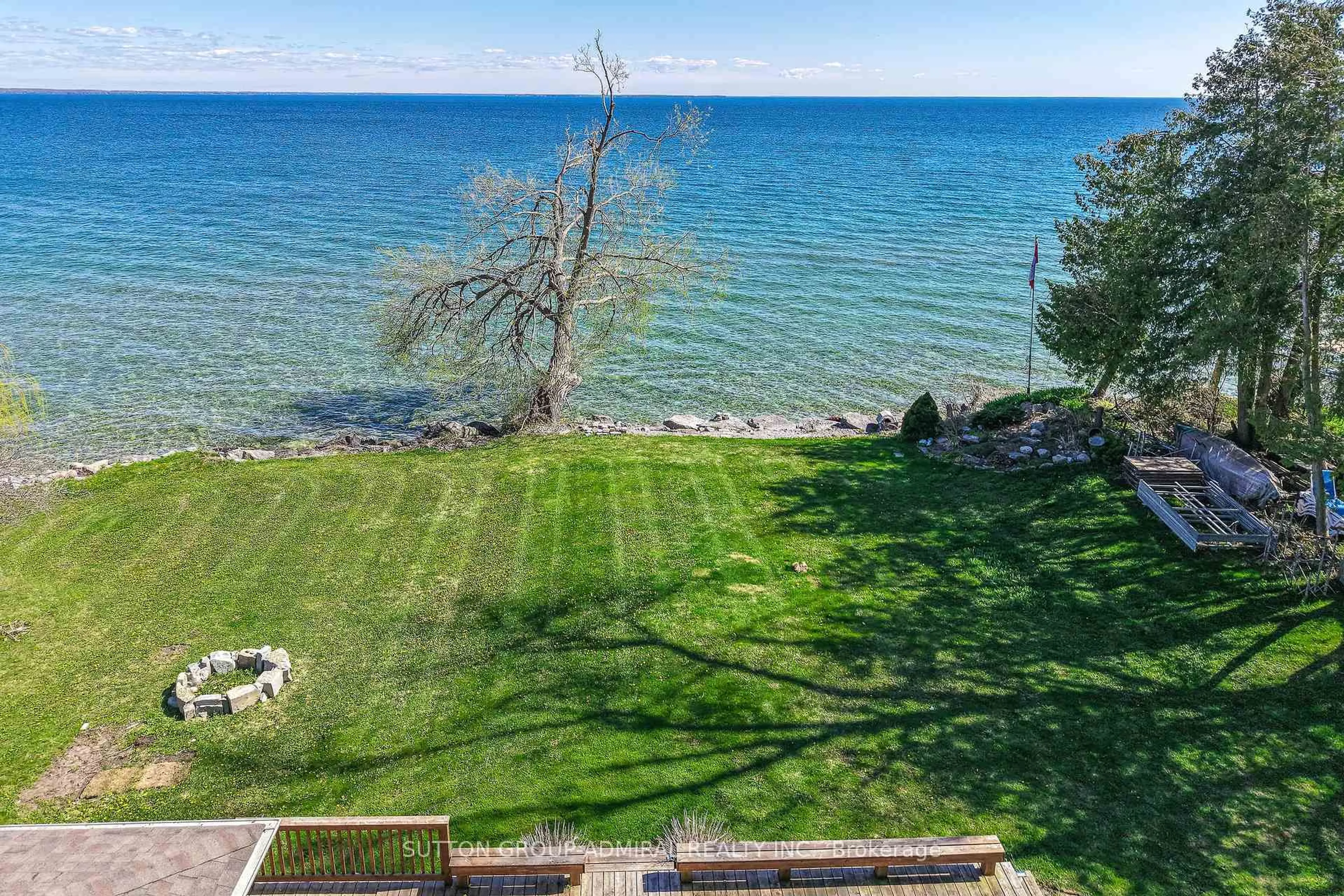 A pic from outside/outdoor area/front of a property/back of a property/a pic from drone, water/lake/river/ocean view for 182 Bayshore Dr, Ramara Ontario L0K 1B0