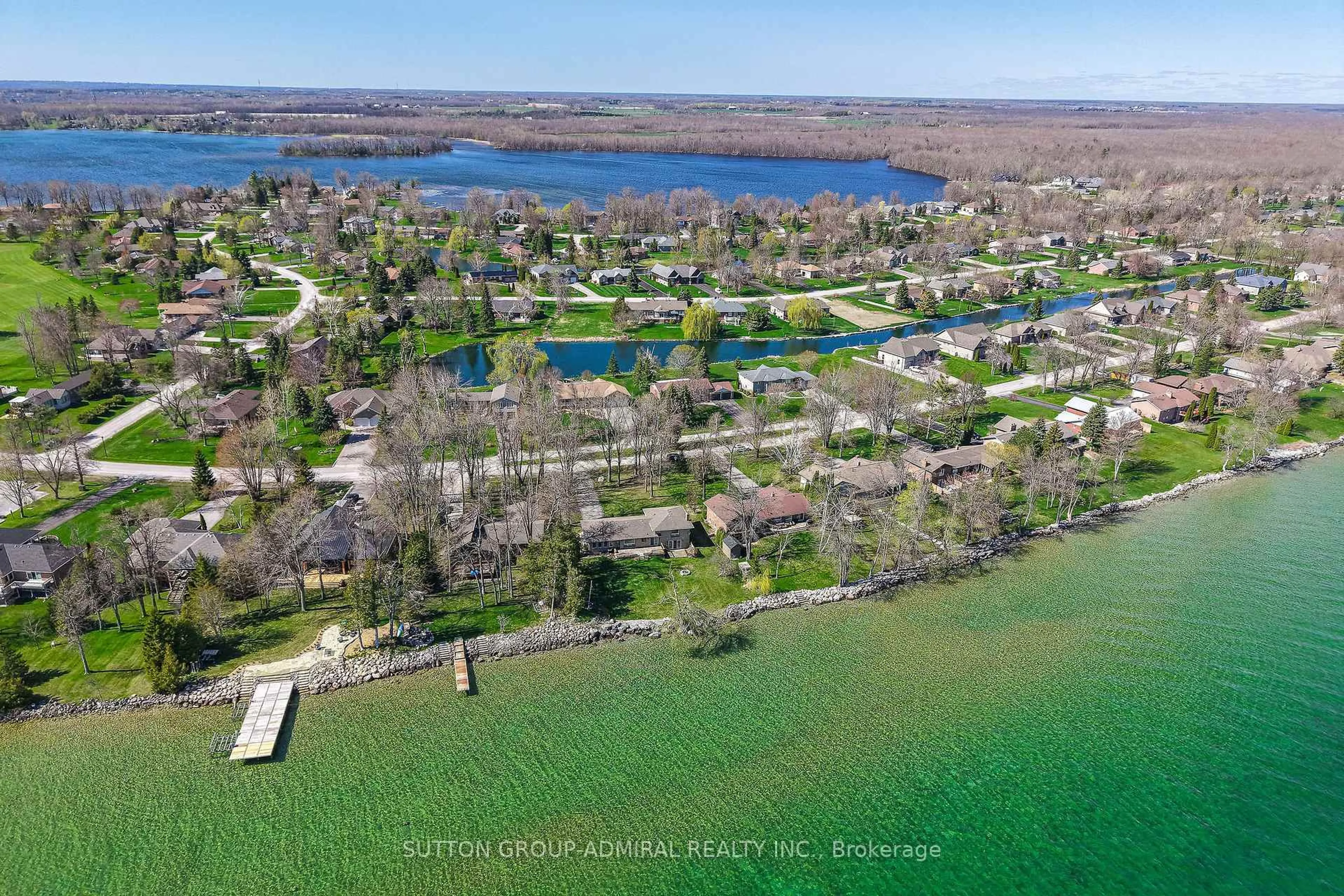 A pic from outside/outdoor area/front of a property/back of a property/a pic from drone, water/lake/river/ocean view for 182 Bayshore Dr, Ramara Ontario L0K 1B0