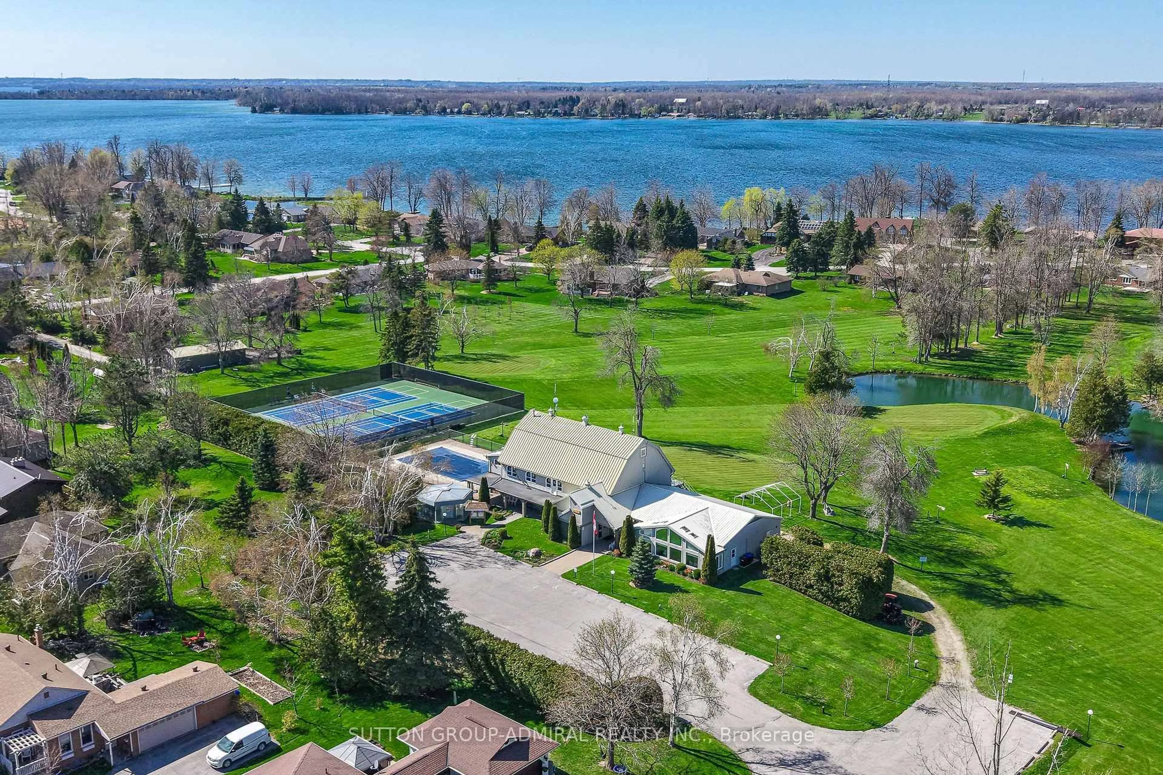 A pic from outside/outdoor area/front of a property/back of a property/a pic from drone, water/lake/river/ocean view for 182 Bayshore Dr, Ramara Ontario L0K 1B0