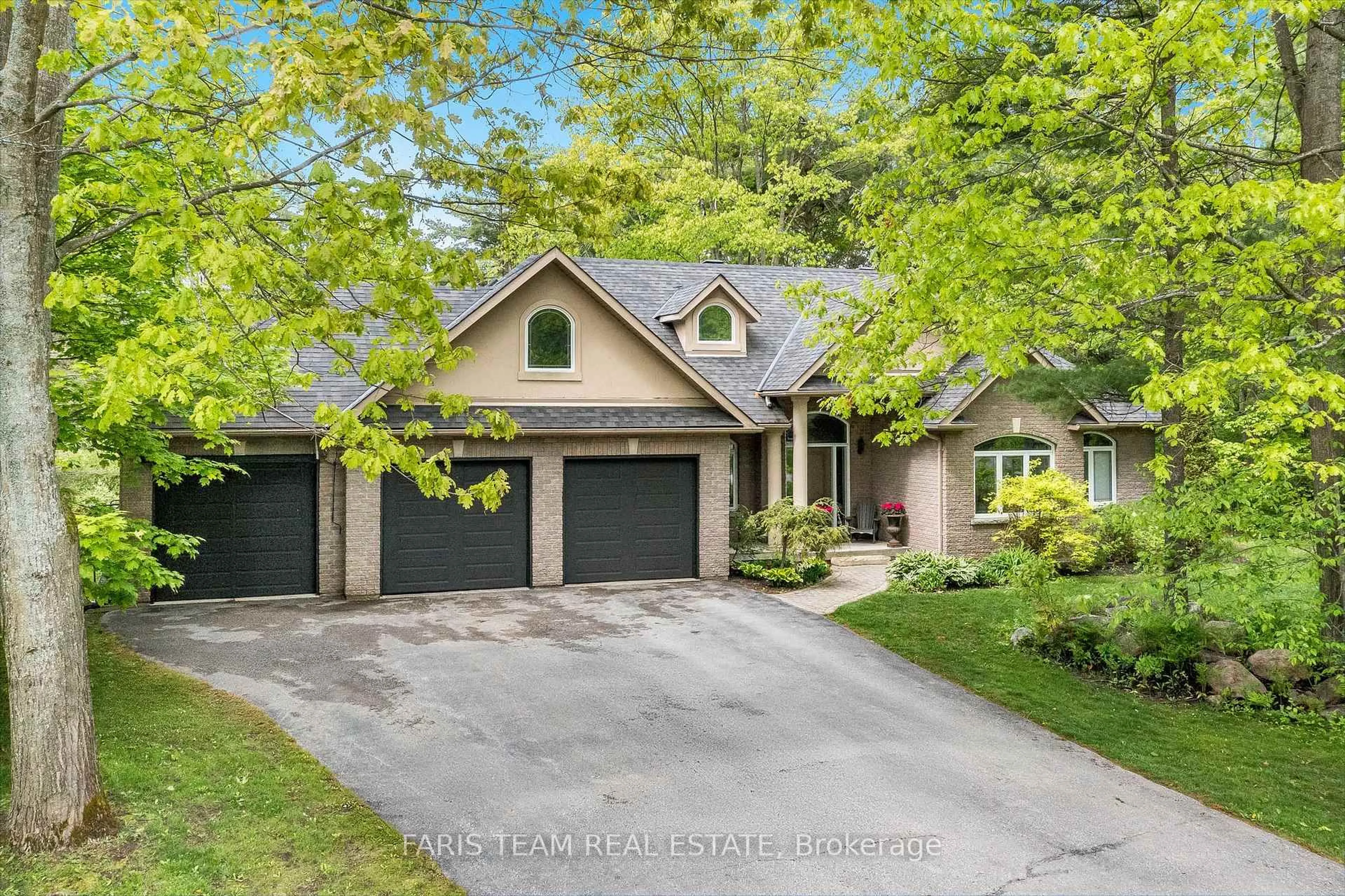 Home with brick exterior material, street for 15 Laddie Lane, Springwater Ontario L0L 1Y2