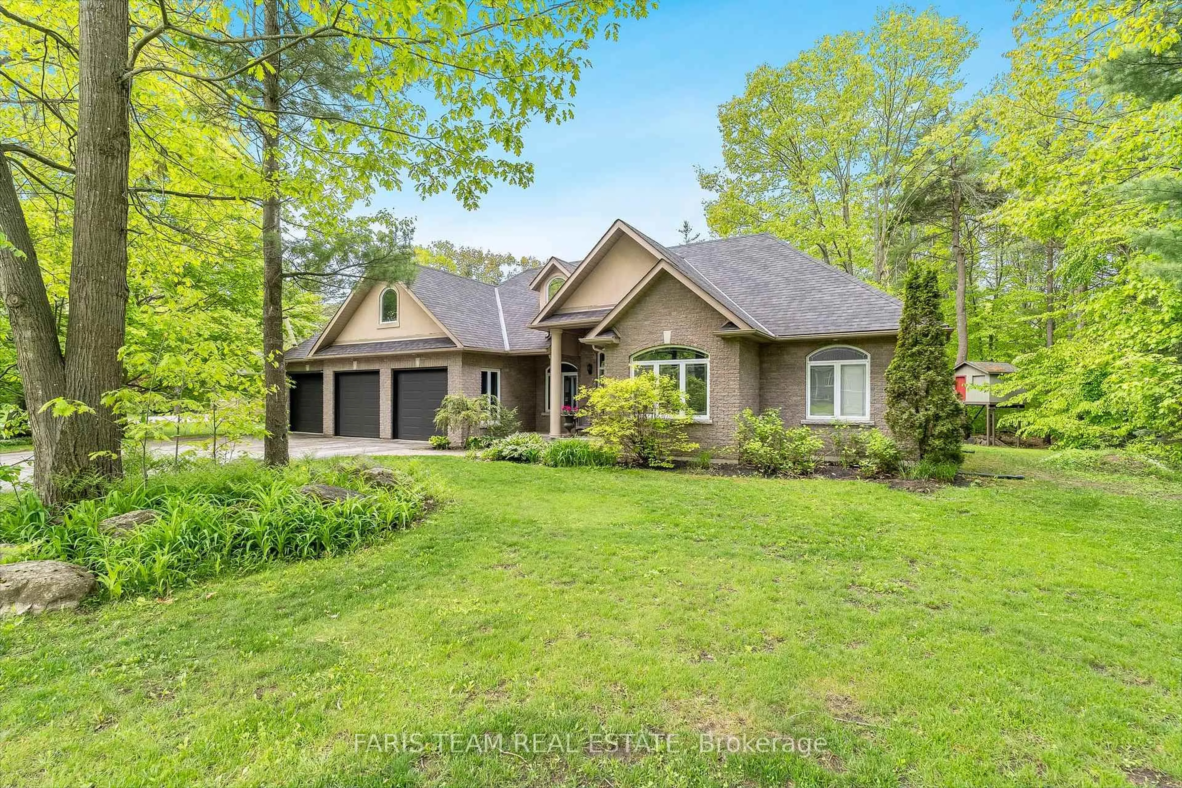 Home with brick exterior material, unknown for 15 Laddie Lane, Springwater Ontario L0L 1Y2
